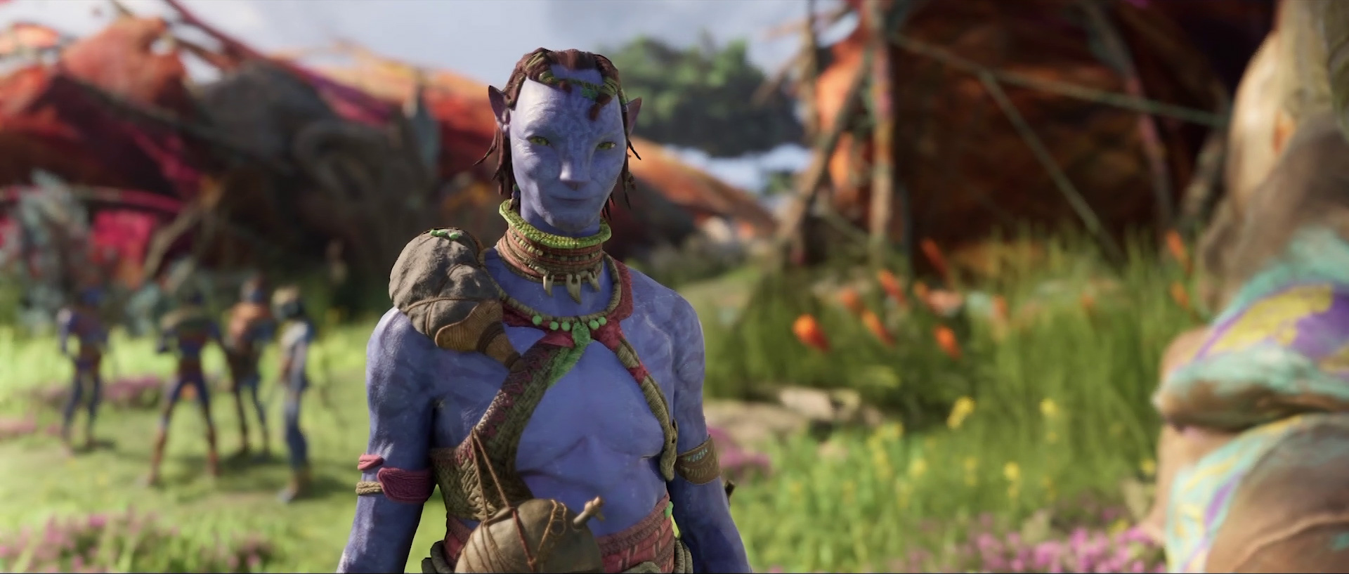 a Na’vi standing in a field in Avatar: Frontiers of Pandora