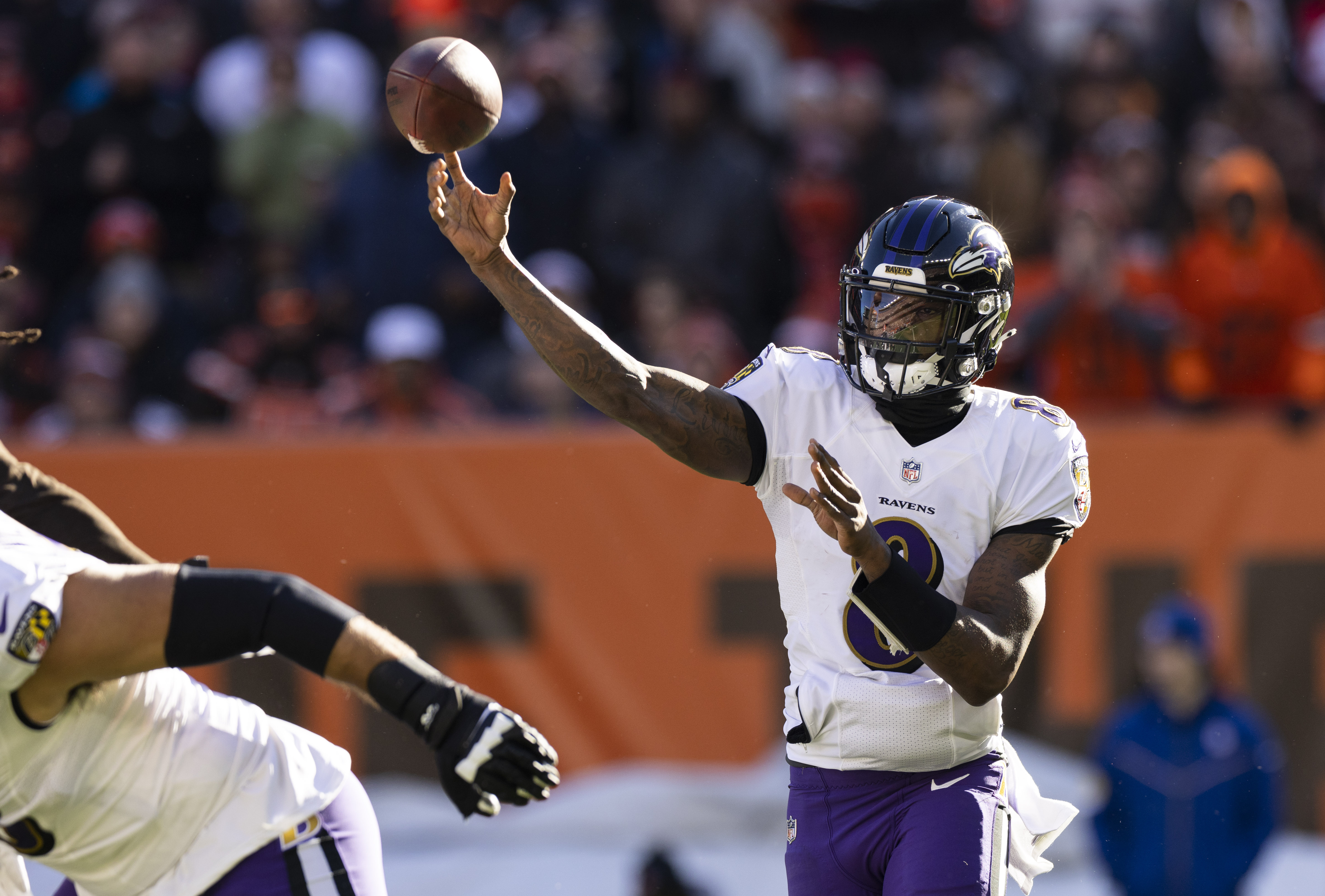 Baltimore Ravens quarterback Lamar Jackson (8) throws the ball against the Cleveland Browns during the first quarter at FirstEnergy Stadium.
