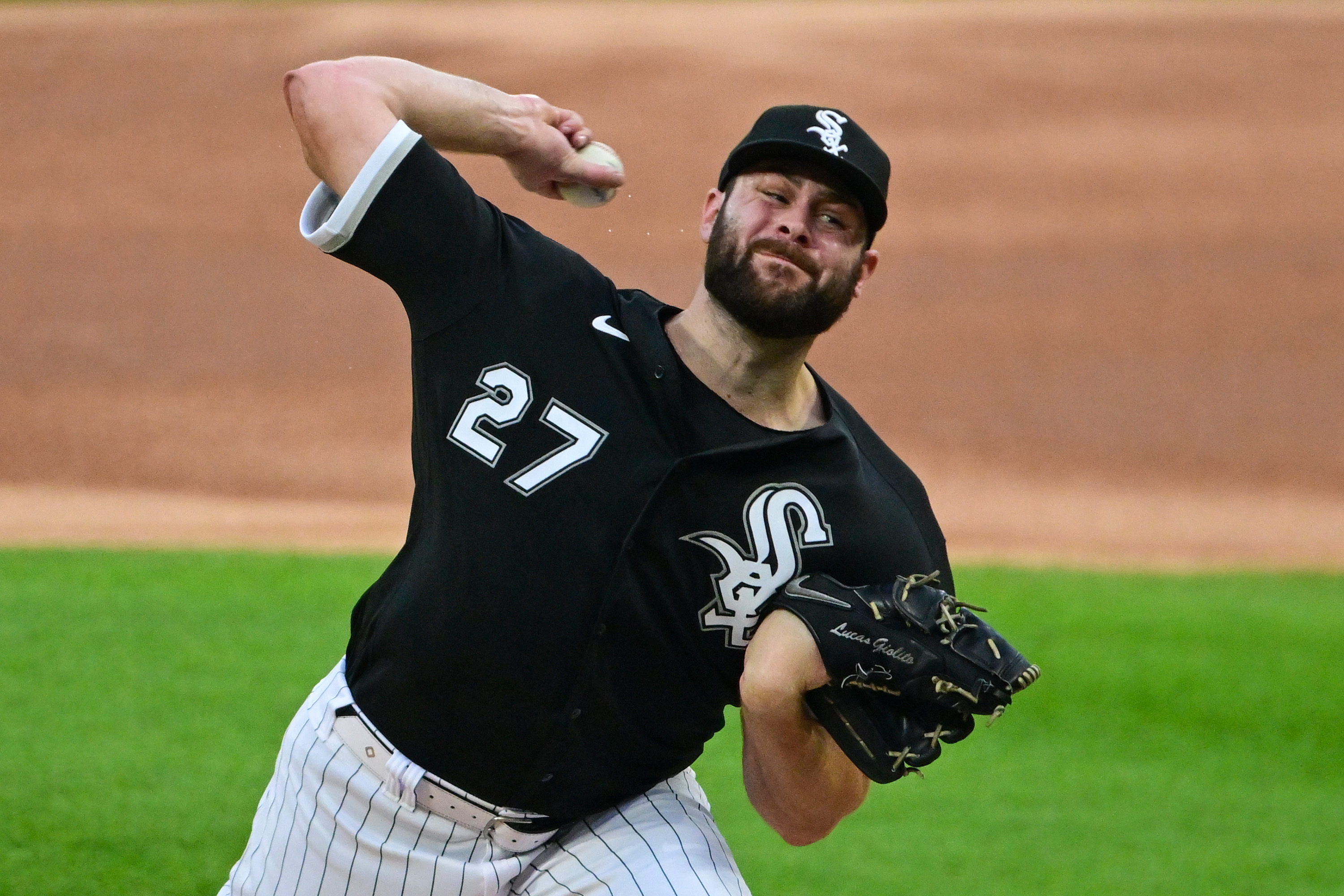 Starting pitcher Lucas Giolito #27 of the Chicago White Sox delivers the baseball in the first inning against the Cleveland Guardians at Guaranteed Rate Field on May 10, 2022 in Chicago, Illinois.