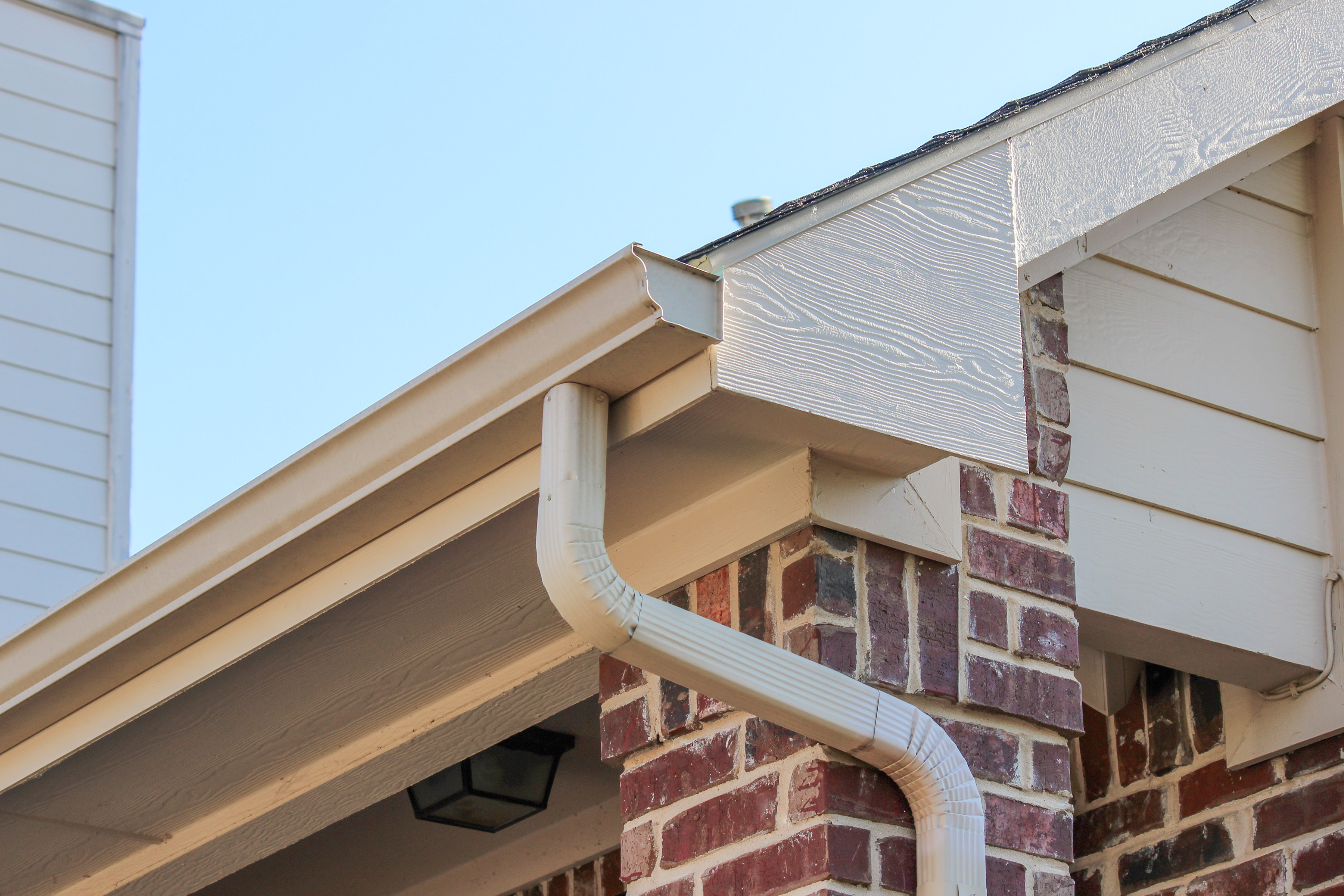 Gutter and downspout on a residential home. 