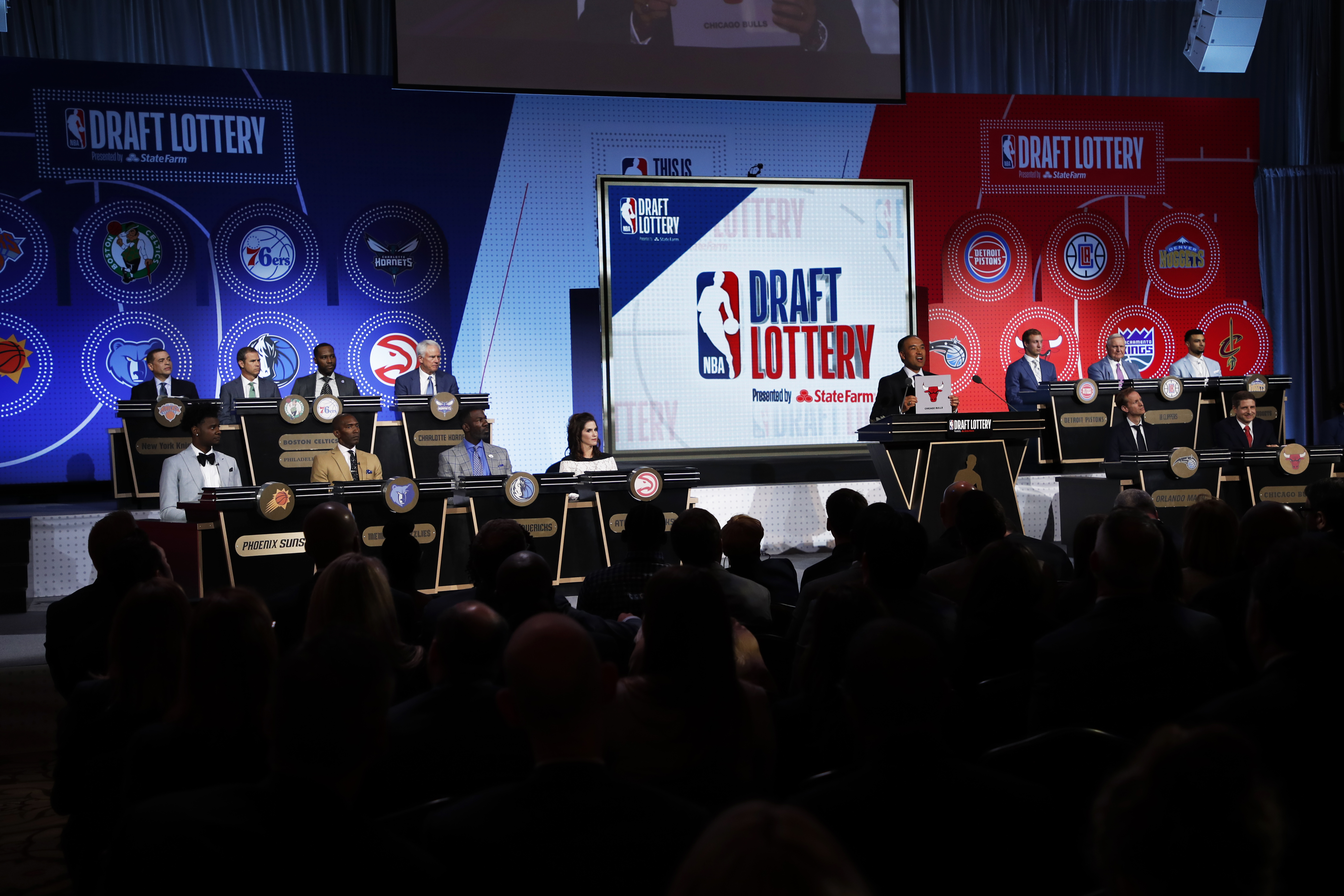 NBA Deputy Commissioner, Mark Tatum awards the Chicago Bulls the number seven pick in the 2018 NBA Draft during the 2018 NBA Draft Lottery at the Palmer House Hotel on May 15, 2018 in Chicago Illinois.