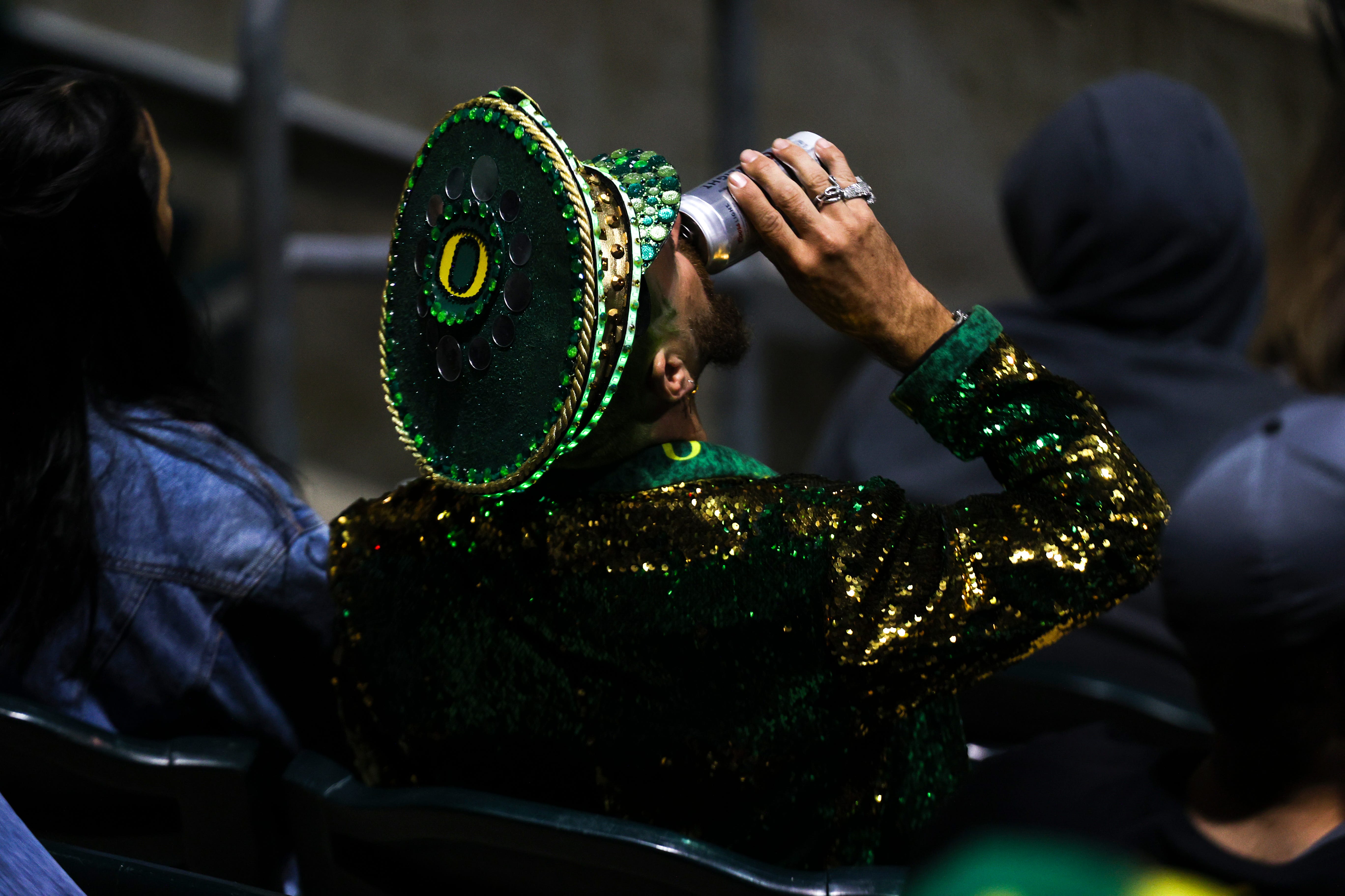 A Oregon Ducks fan celebrates at the close of the Ducks’ 7-3 victory against the Gonzaga Bulldogs in the NCAA Regional game at PK Park in Eugene, Oregon on Saturday, June 5, 2021.