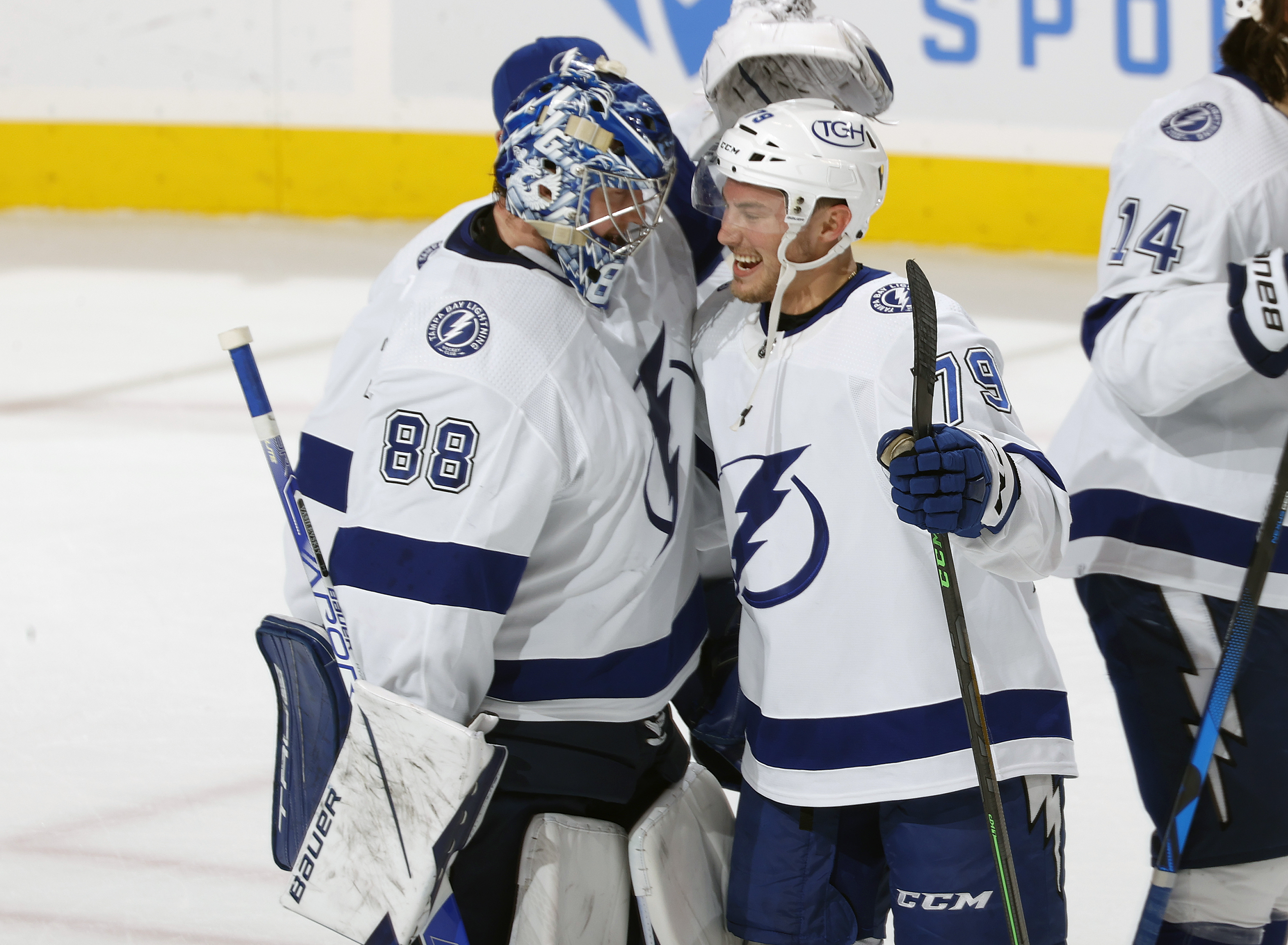 Goaltender Andrei Vasilevskiy #88 and Ross Colton #79 of the Tampa Bay Lightning celebrate the win against the Florida Panthers in Game Two of the Second Round of the 2022 NHL Stanley Cup Playoffs at the FLA Live Arena on May 19, 2022 in Sunrise, Florida. The Lightning defeated the Panthers 2-1.