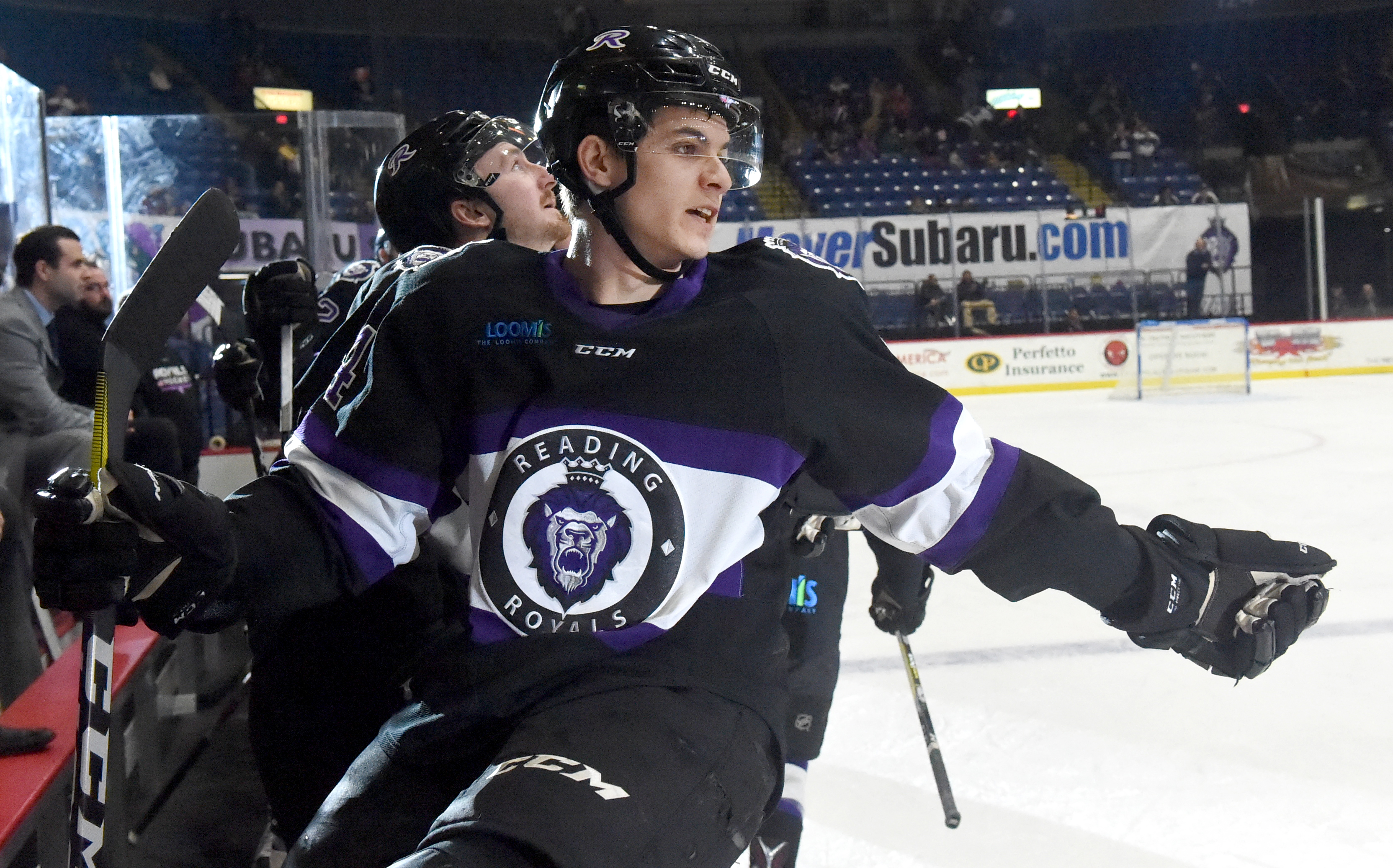 HOCKEY - Reading forward Mike Pereira (14) offers congratulations on Justin Crandall’s goal. HOCKEY - The Reading Royals were defeated by the South Carolina Stingrays 5-4 at the Santander Arena. HOCKEY Royals vs Stingrays Photo by Harold