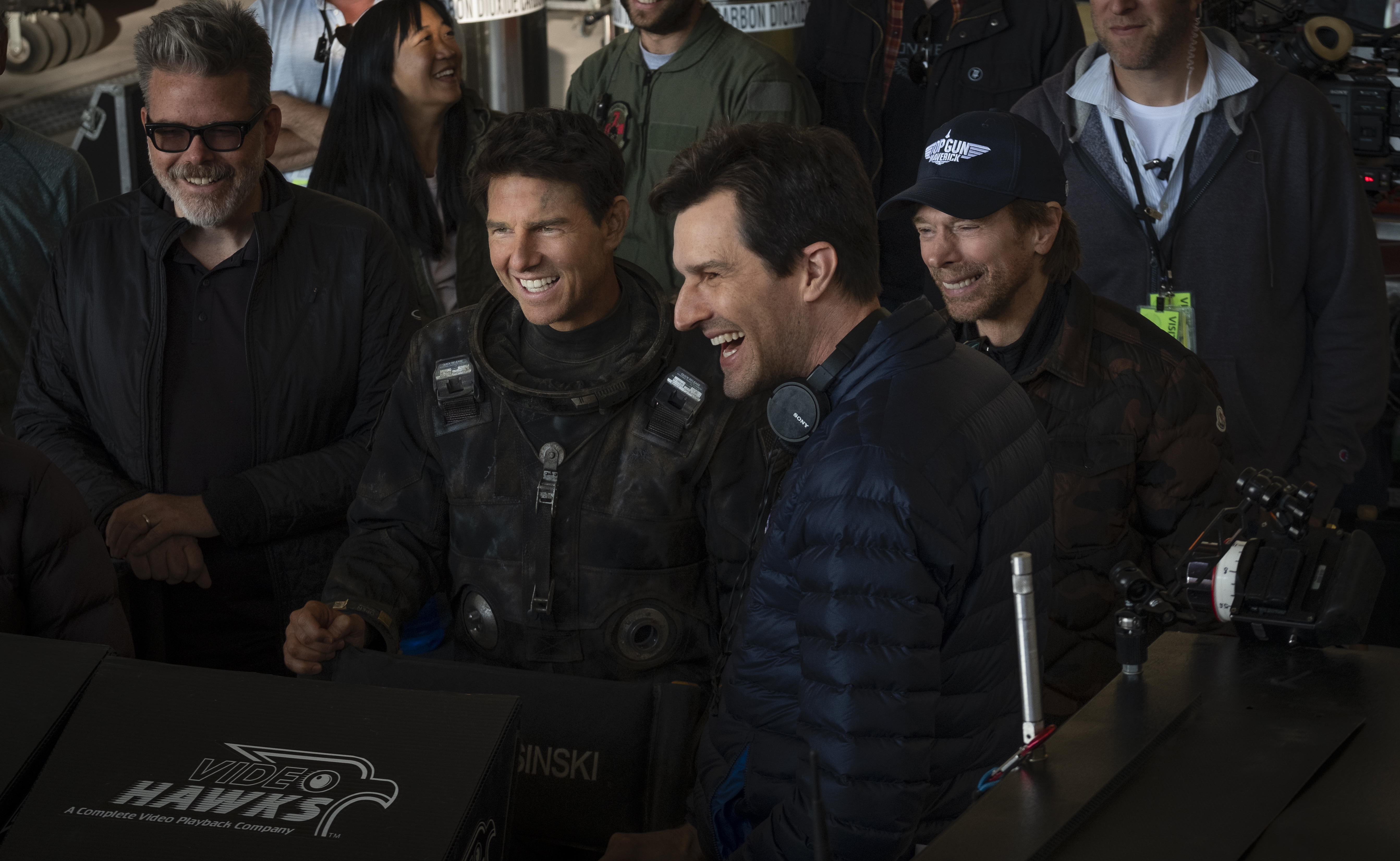 Director Joseph Kosinski on set with Tom Cruise and Chris McQuarrie during the filming of Top Gun: Maverick