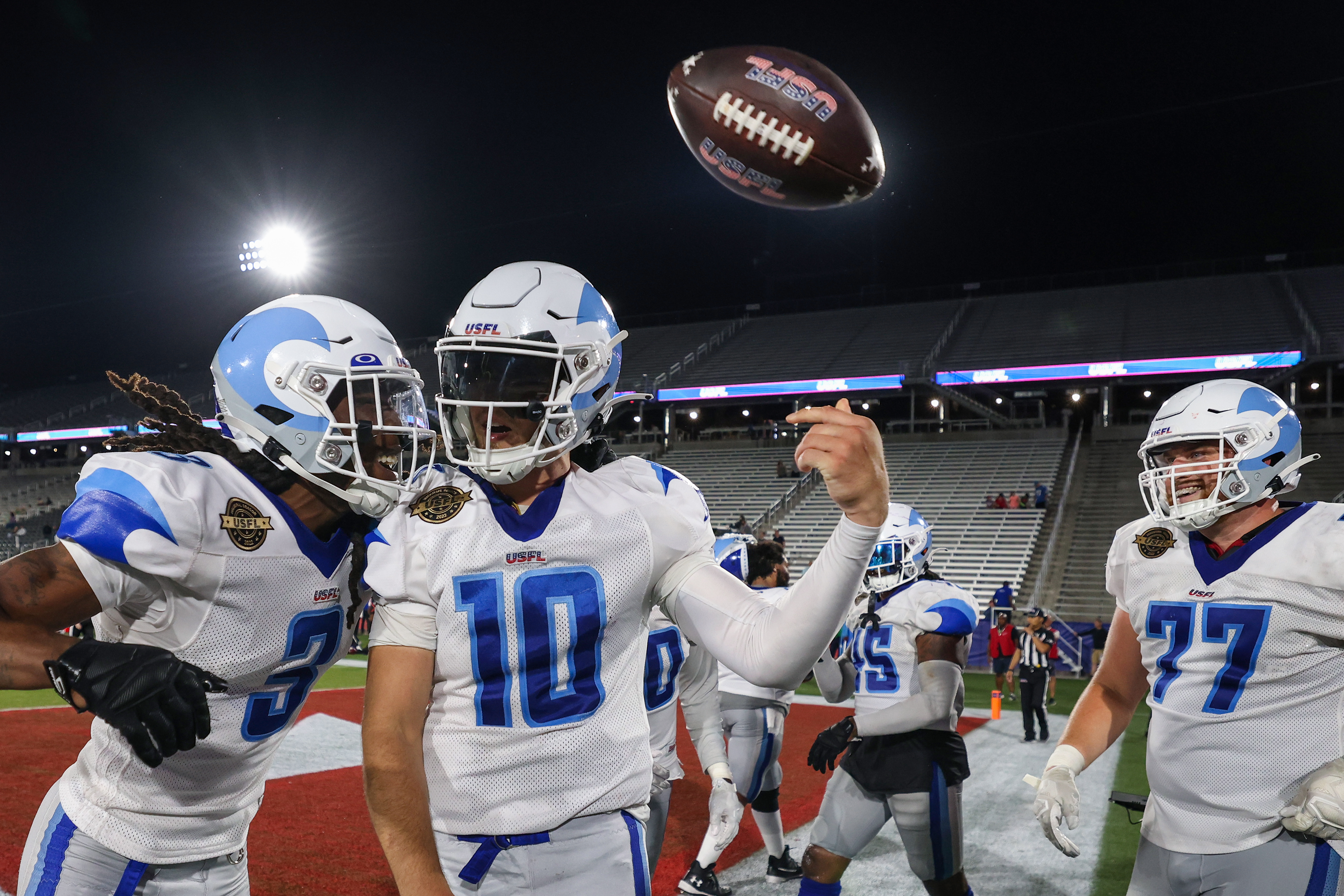 Quarterback Kyle Sloter #10 of the New Orleans Breakers celebrates after scoring the game-winning touchdown with teammate Adonis Alexander #3 in overtime against the Michigan Panthers at Protective Stadium on May 28, 2022 in Birmingham, Alabama.