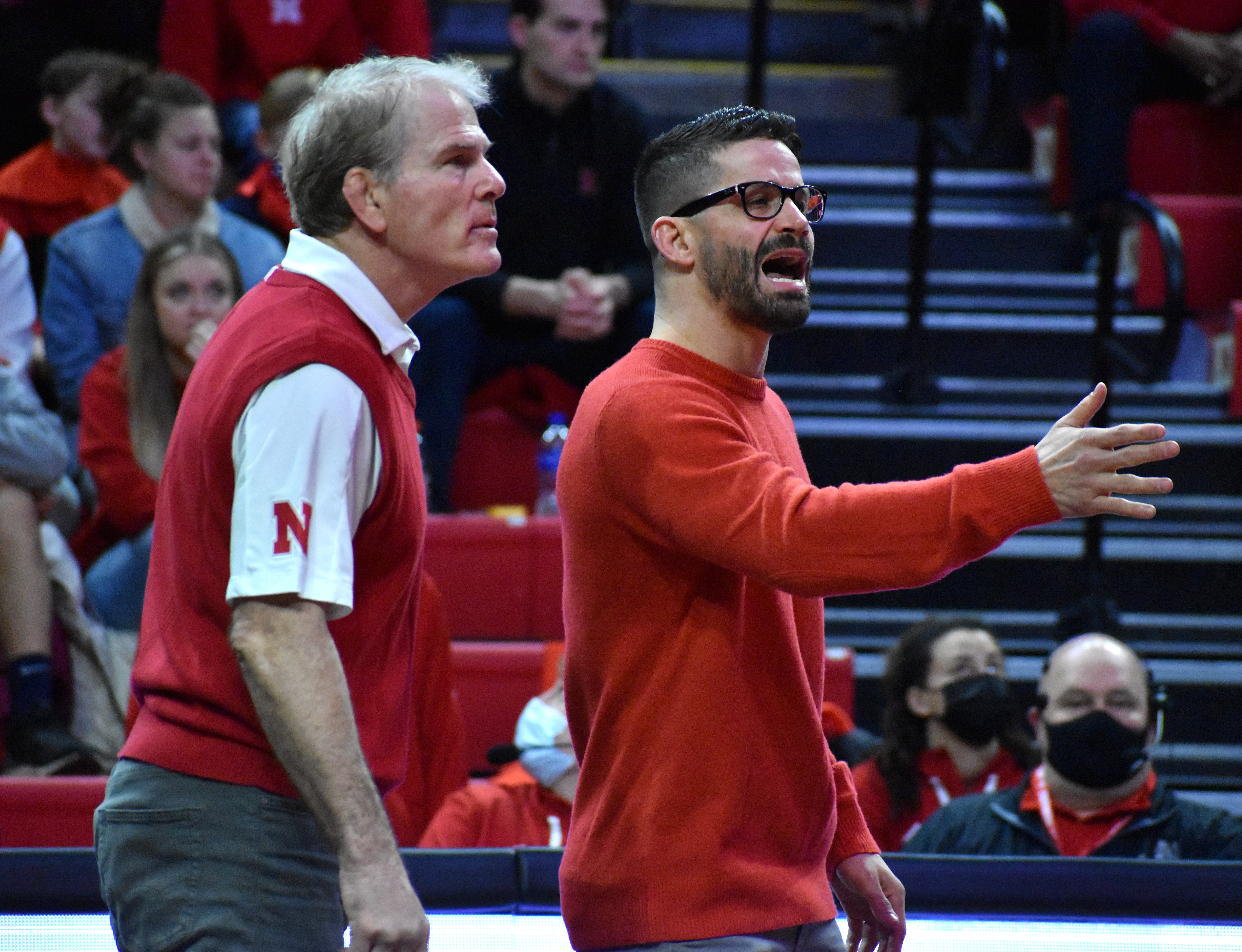 Nebraska Head Coach Mark Manning (left) and Associate Head Coach Bryan Snyder look on during a dual against Illinois on Feb. 13, 2022 at the Bob Devaney Sports Center.