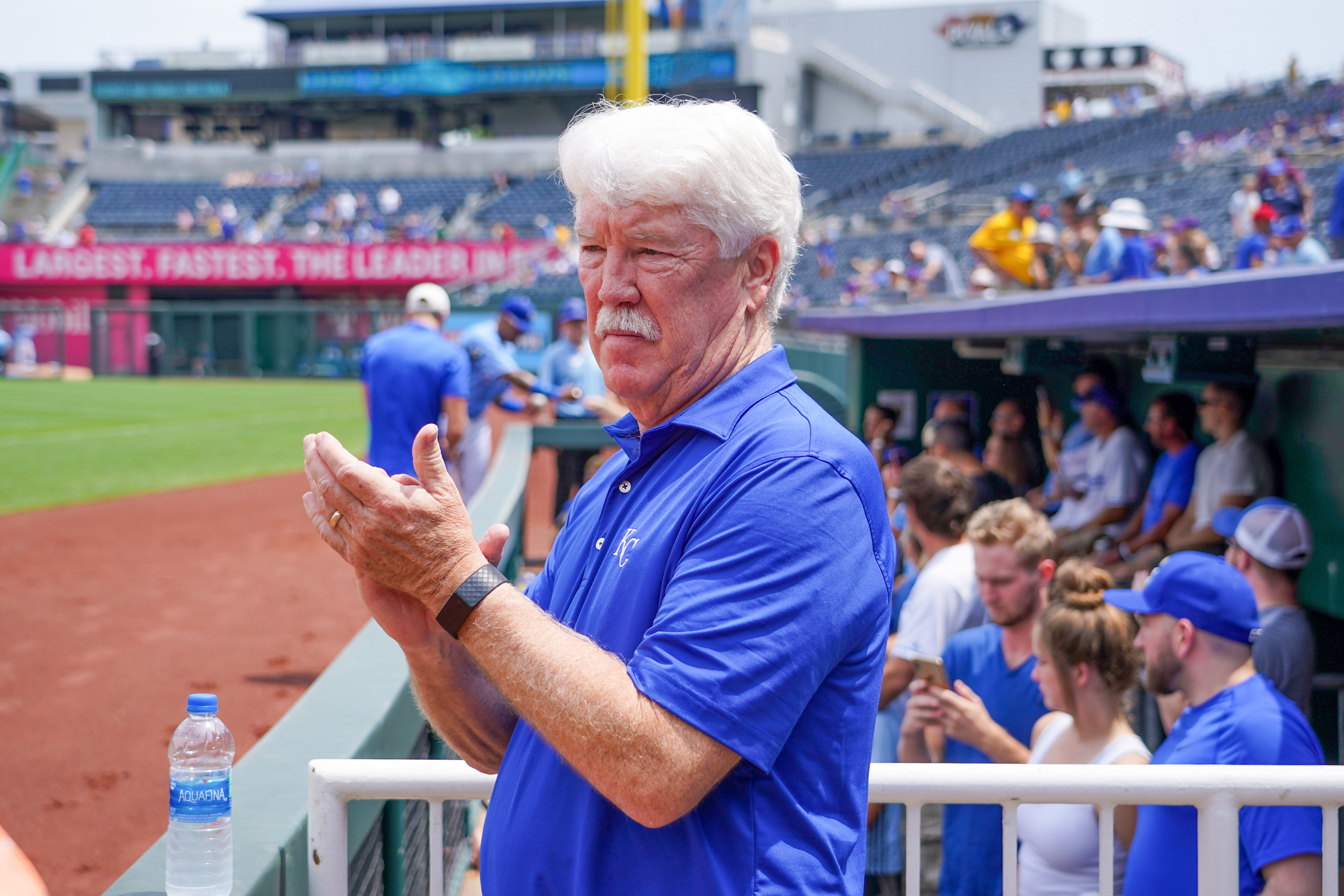 Kansas City Royals owners group principal owner John Sherman applauds during warm ups before the game against the Detroit Tigers at Kauffman Stadium.