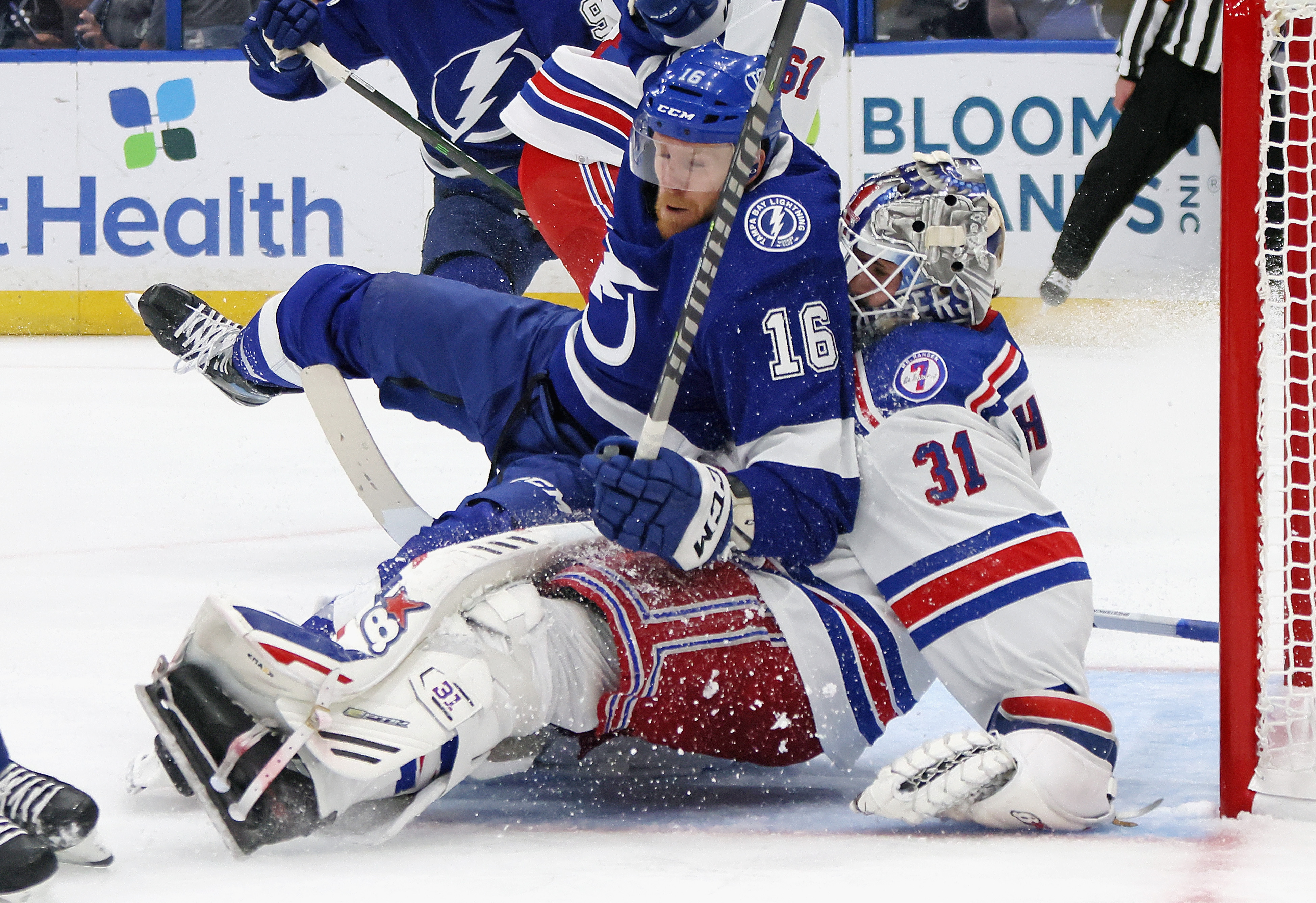 Riley Nash #16 of the Tampa Bay Lightning goal tender interference on Igor Shesterkin #31 of the New York Rangers during the second period in Game Three of the Eastern Conference Final of the 2022 Stanley Cup Playoffs at Amalie Arena on June 05, 2022 in Tampa, Florida.