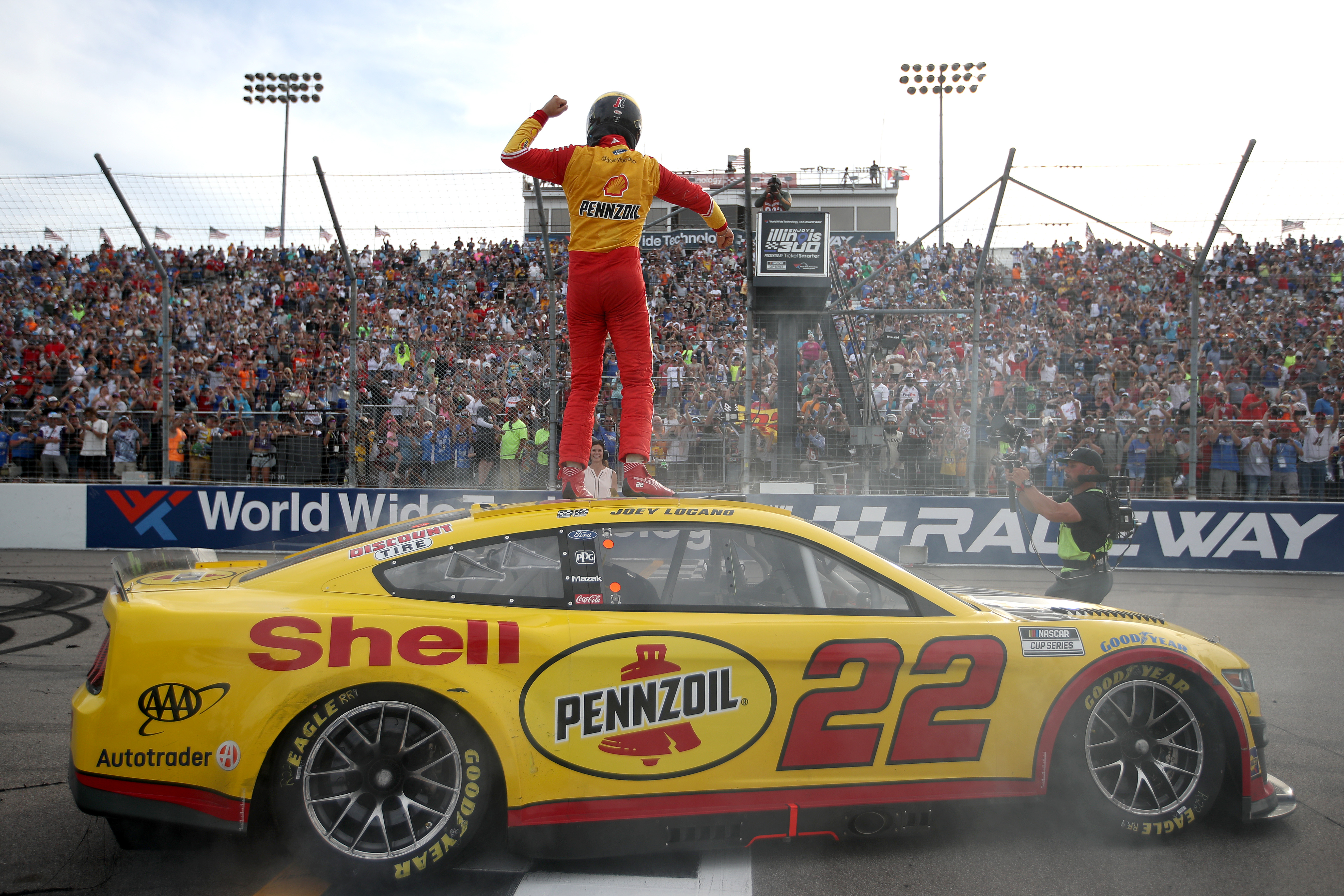 Joey Logano, driver of the #22 Shell Pennzoil Ford, celebrates after winning the NASCAR Cup Series Enjoy Illinois 300 at WWT Raceway on June 05, 2022 in Madison, Illinois.