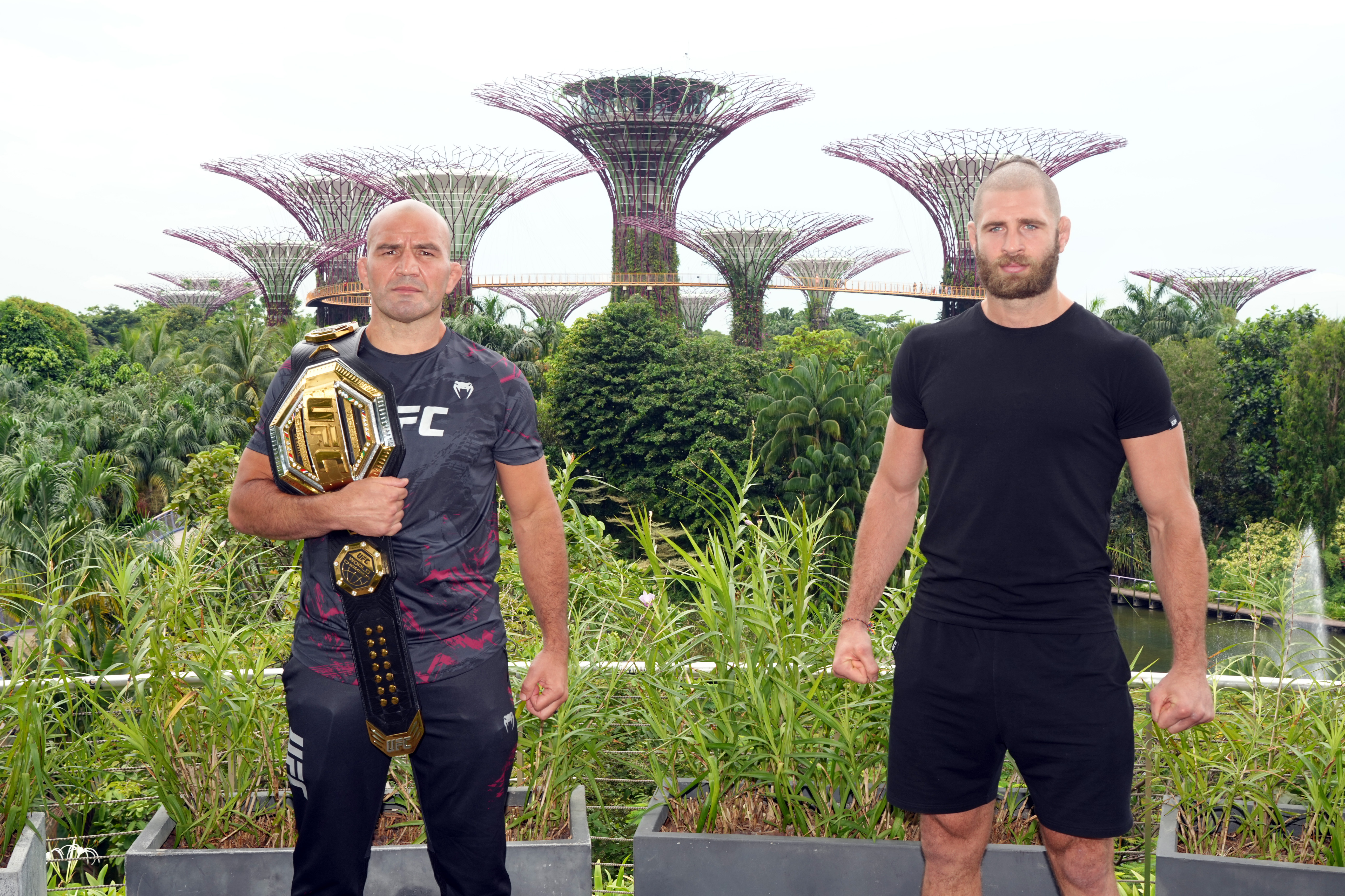 UFC light heavyweight champion Glover Texeira of Brazil and Jiri Prochazka of Czech Republic pose during a UFC photo session at Gardens by the Bay on June 7, 2022 in Singapore.