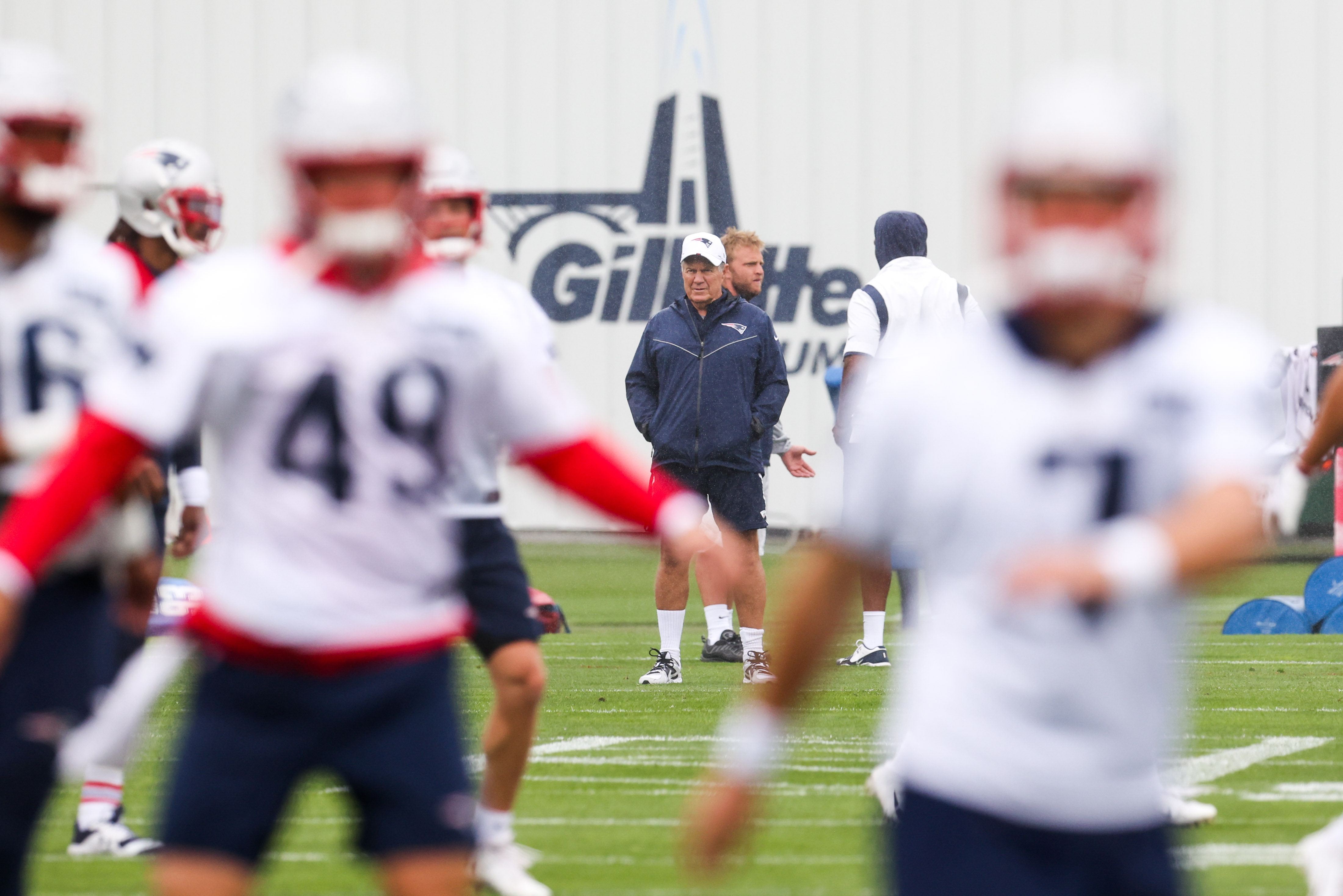 Foxborough, MA, United States; New England Patriots head coach Bill Belichick watches warm ups during training camp at Gillette Stadium.