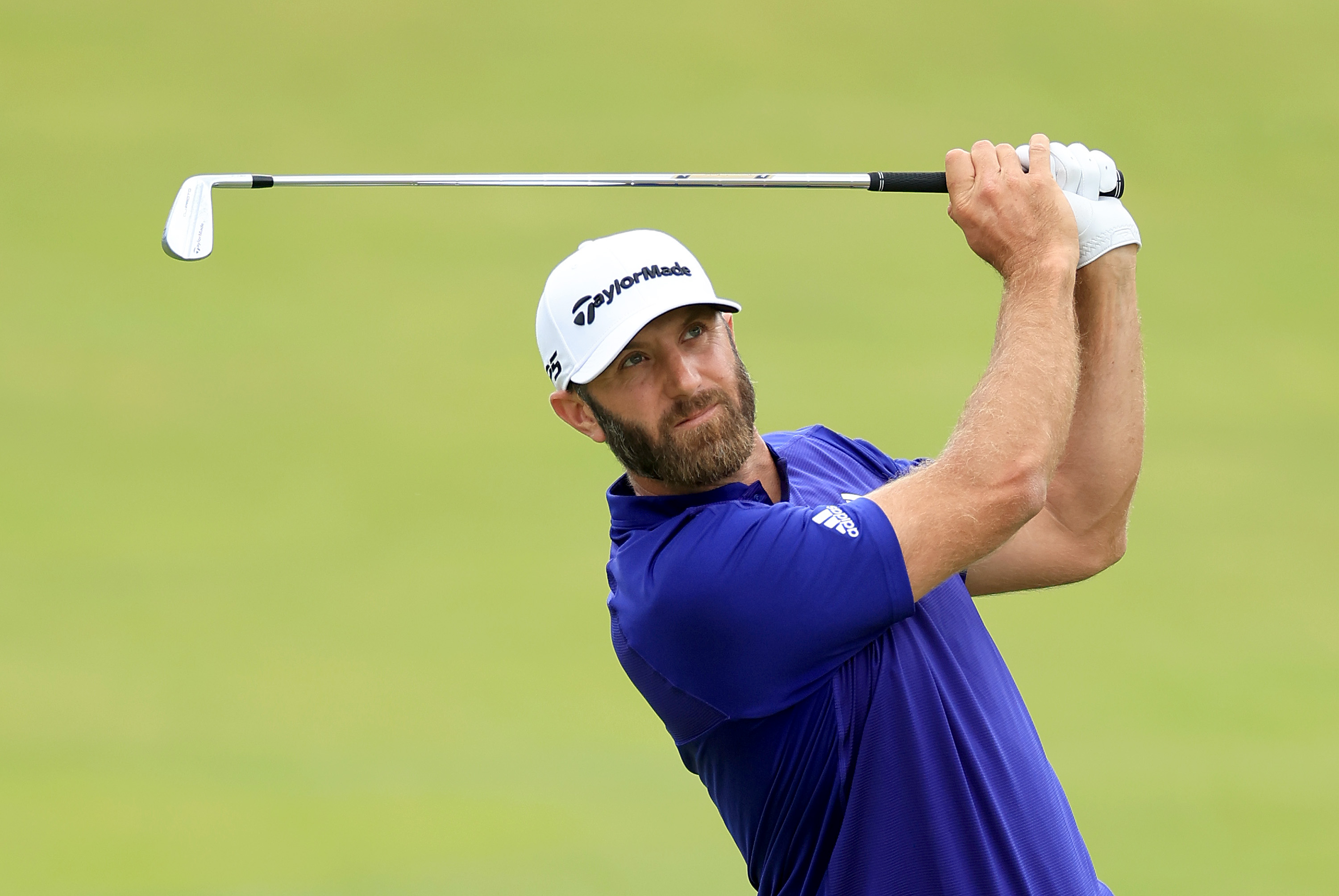 Dustin Johnson of The United States plays his second shot on the eighth hole during the first round of the 2022 U.S.Open Championship at The Country Club on June 16, 2022 in Brookline, Massachusetts.