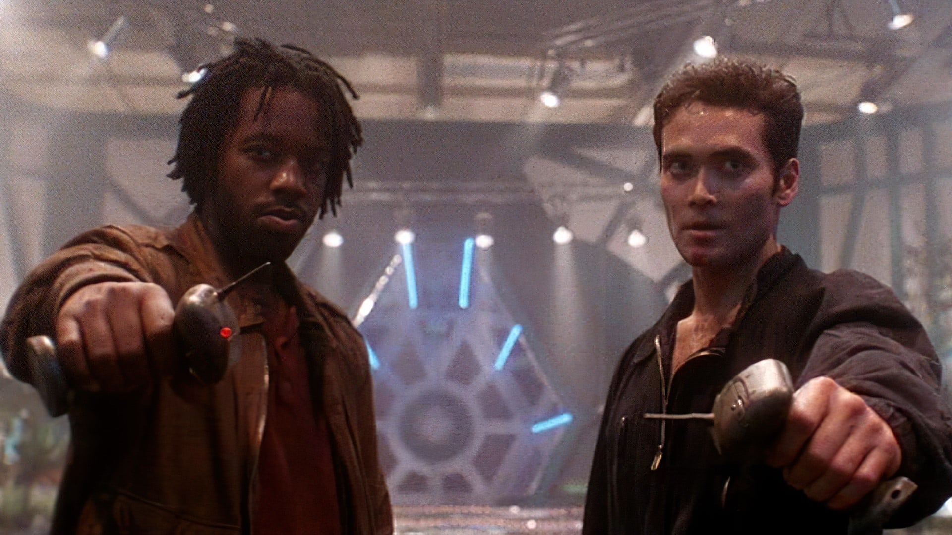 Kadeem Hardison and Mark Dacascos as Toby Wong and Malik Brody in Drive (1997),