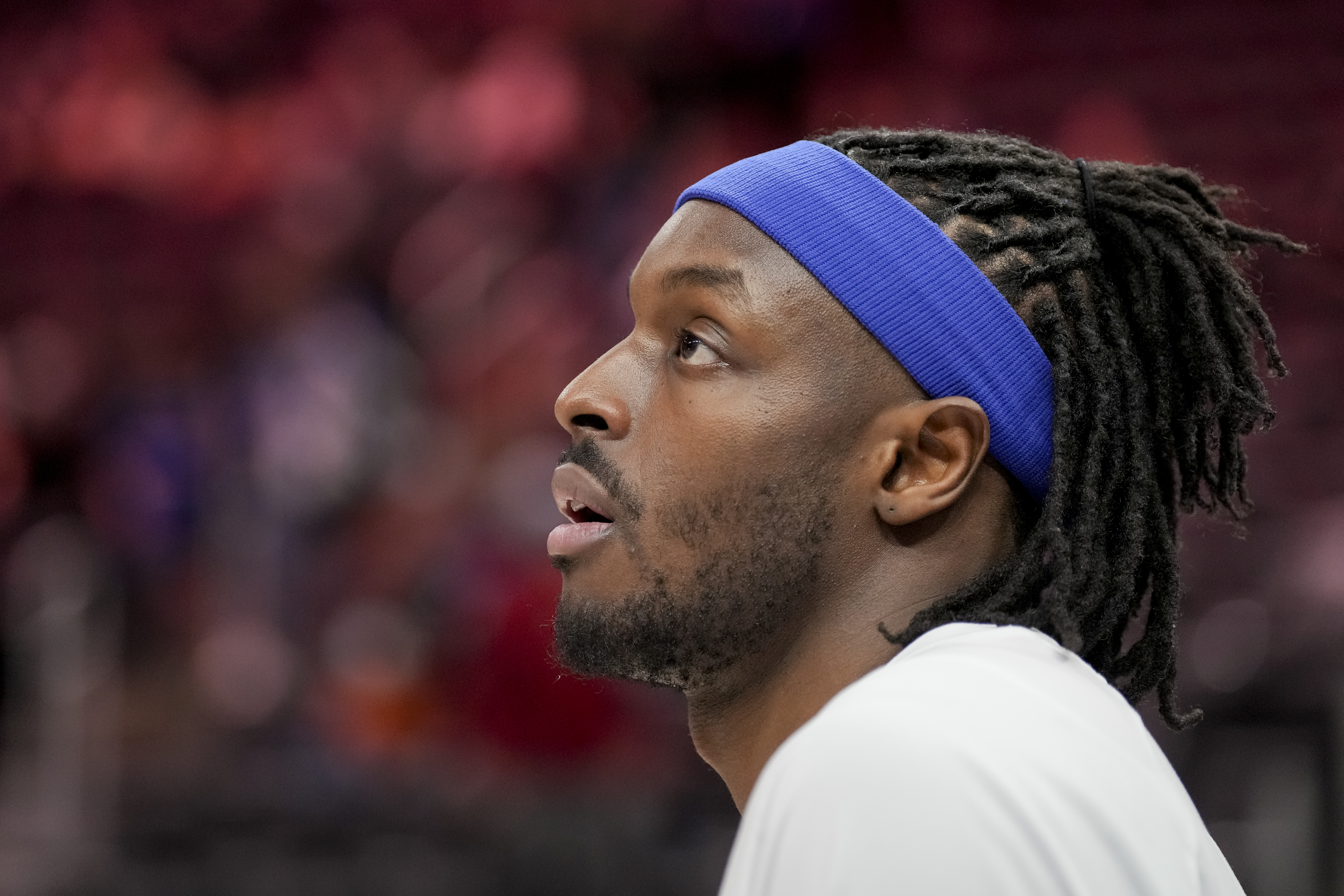 Jerami Grant #9 of the Detroit Pistons looks on before the game against the Washington Wizards at Little Caesars Arena on March 25, 2022 in Detroit, Michigan.