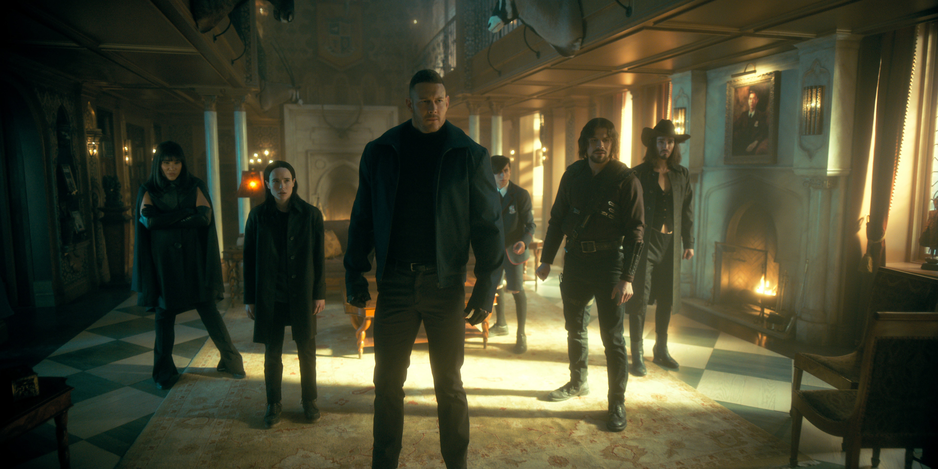 The Umbrella Academy. (L to R) Emmy Raver-Lampman as Allison Hargreeves, Elliot Page, Tom Hopper as Luther Hargreeves, Aidan Gallagher as Number Five, David Castañeda as Diego Hargreeves, Robert Sheehan as Klaus Hargreeves in episode 301 of The Umbrella Academy.
