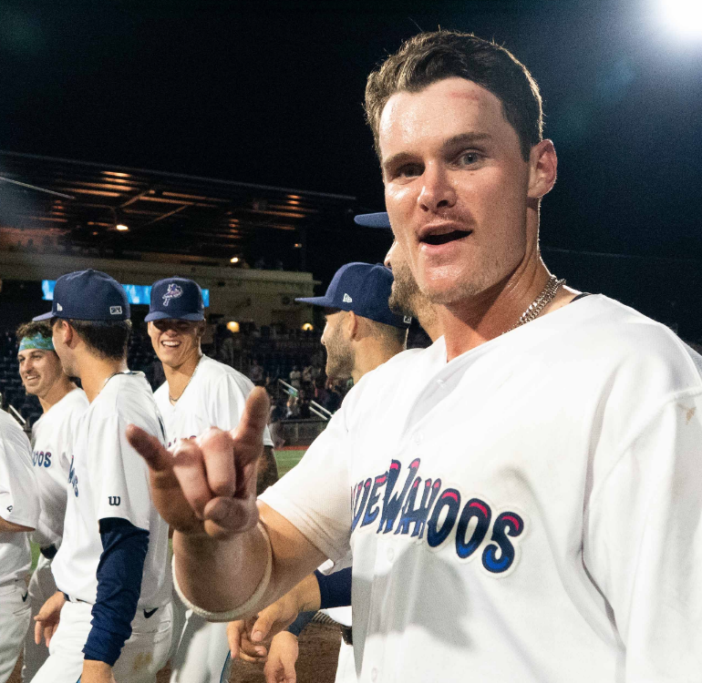 Pensacola Blue Wahoos outfielder Griffin Conine celebrates the team clinching a 2022 postseason berth