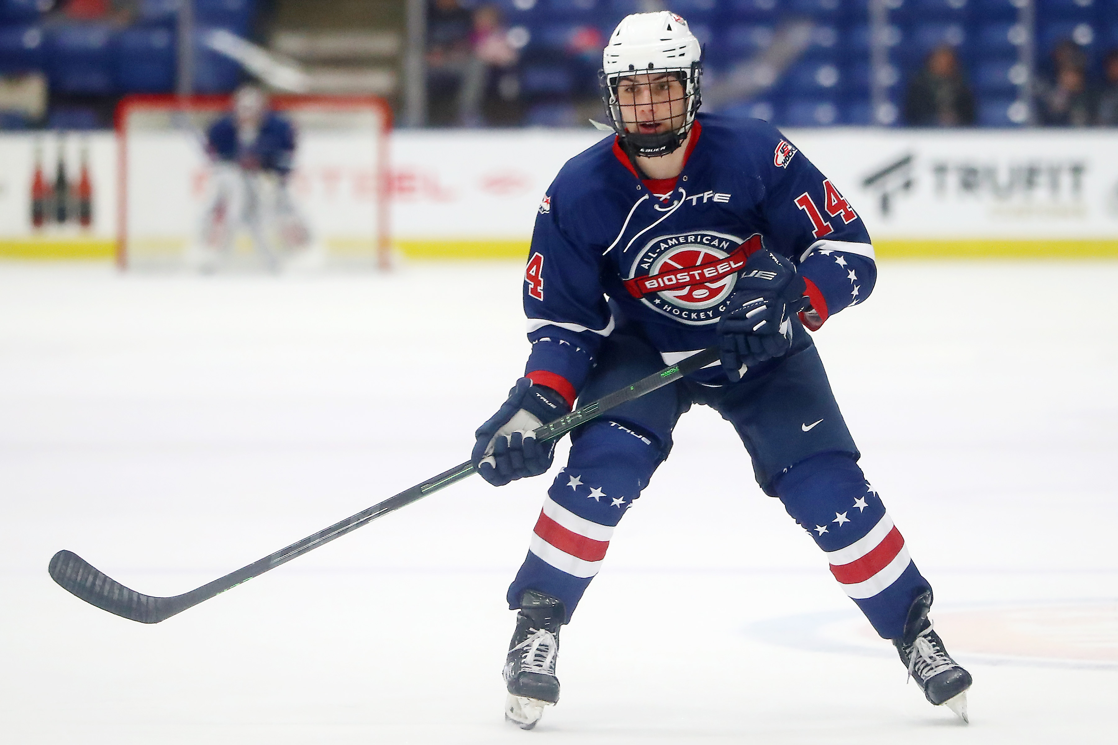 Frank Nazar III #14 of Team Blue skates up the ice in the first period at USA Hockey Arena on January 17, 2022 in Plymouth, Michigan.