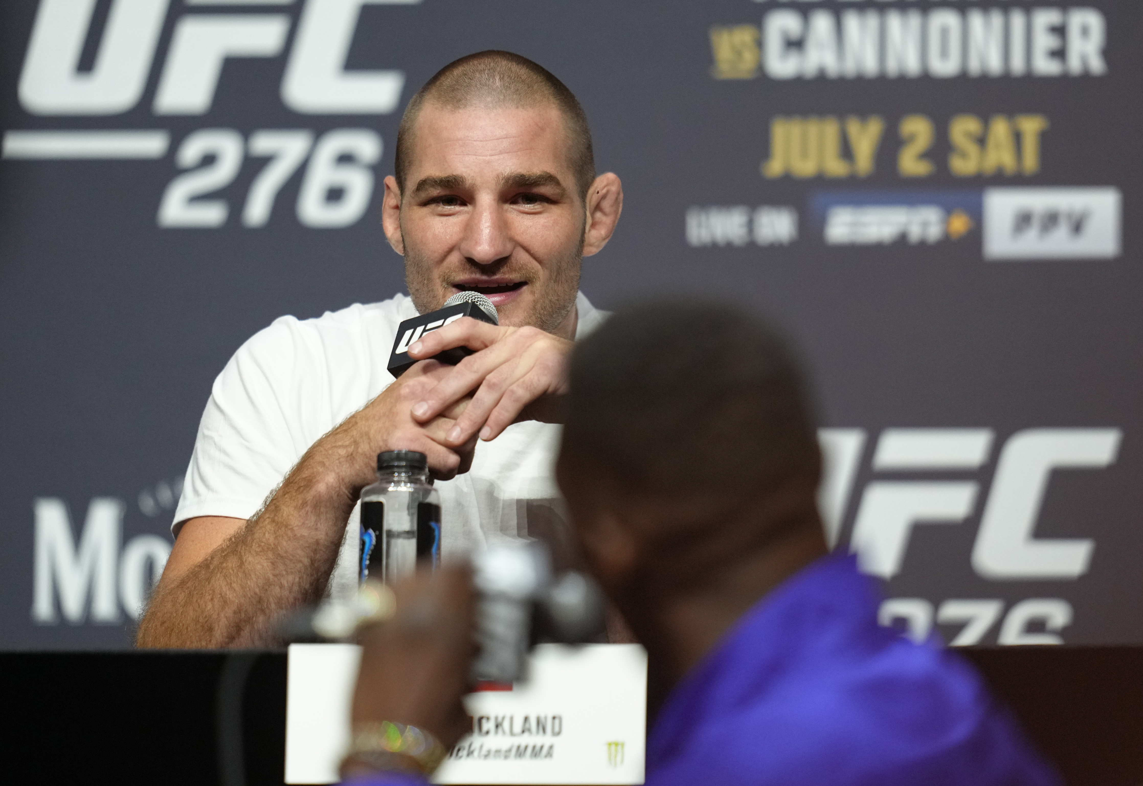 Sean Strickland and Israel Adesanya talk smack at each other during the UFC 276 pre-fight presser.