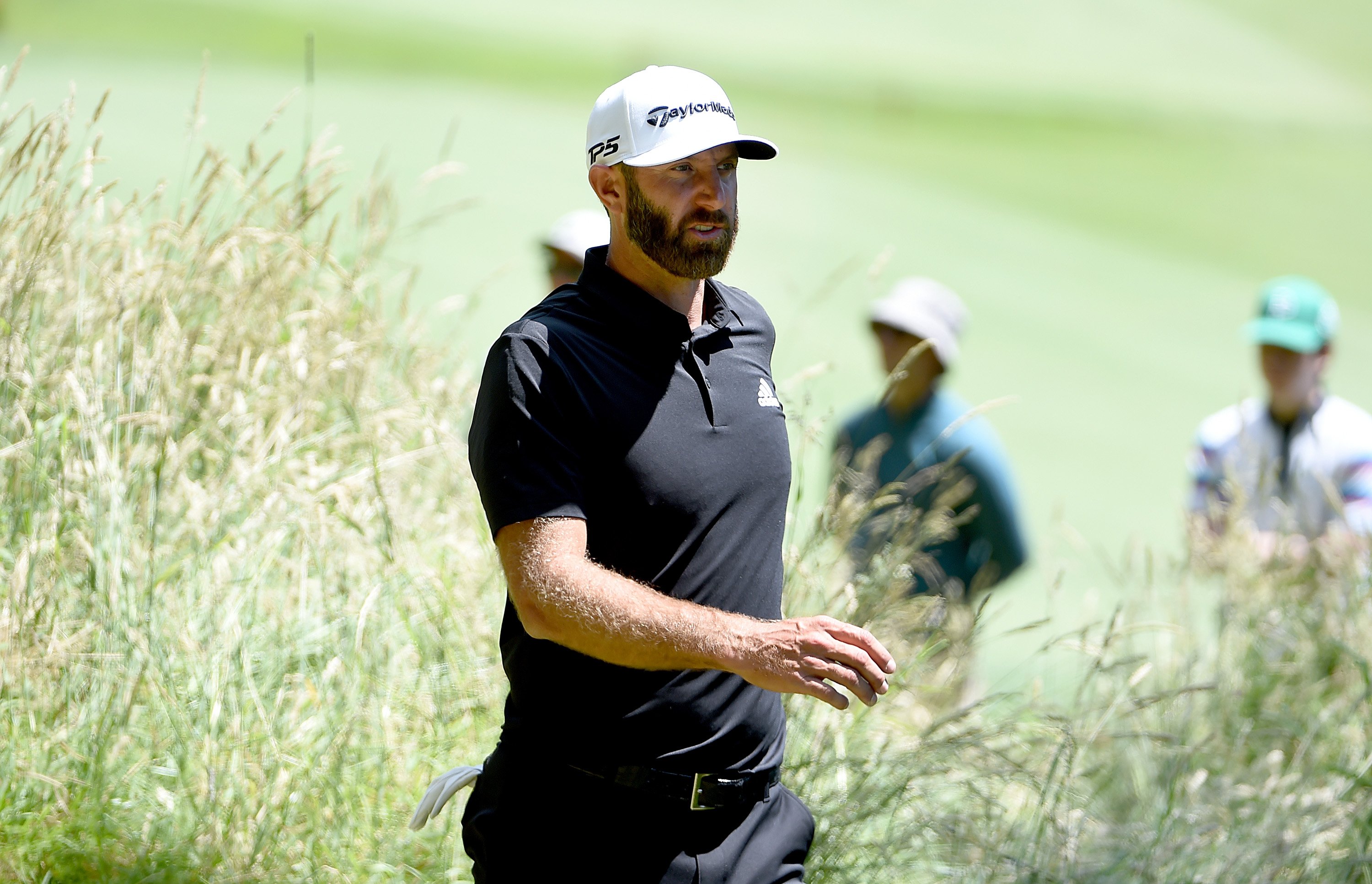 Dustin Johnson walks off the tee box on the fifth hole during round two of the LIV Golf Invitational - Portland at Pumpkin Ridge Golf Club on July 01, 2022 in North Plains, Oregon.