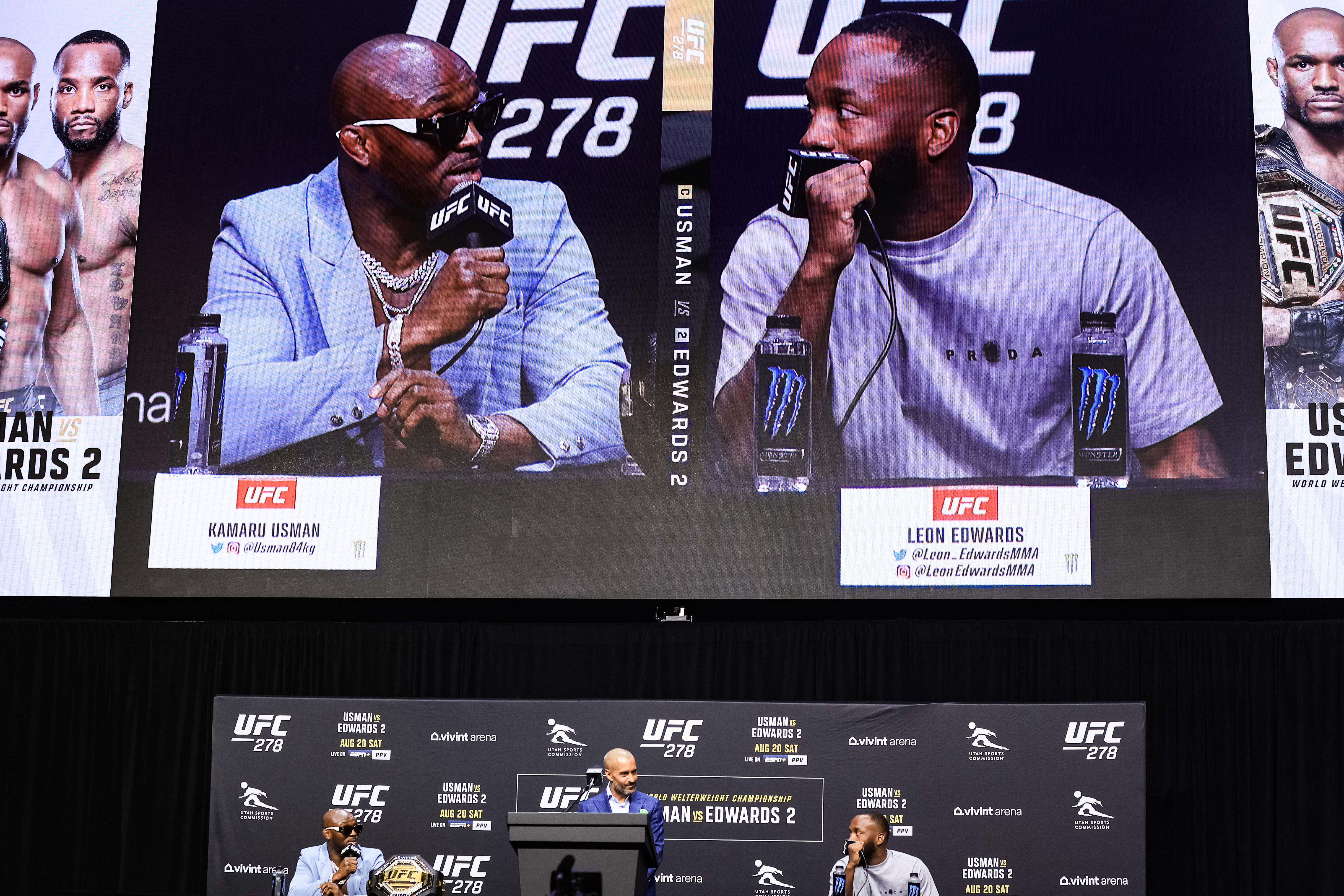 Kamaru Usman talks with Leon Edwards at the UFC 278 press conference.
