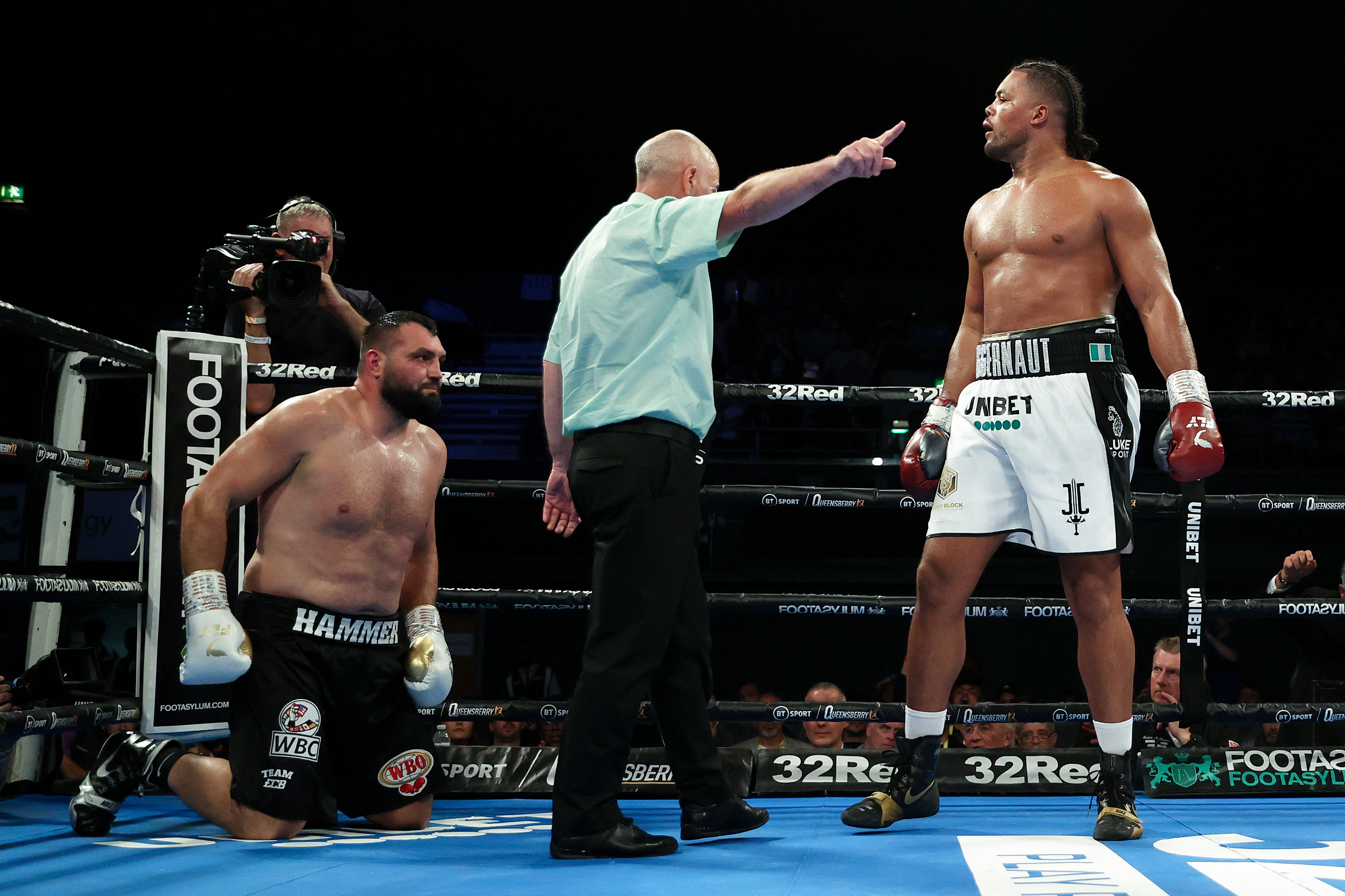 Joe Joyce reacts after knocking down Christian Hammer during the WBC Silver Silver and WBO International Heavyweight Title fight between Joe Joyce and Christian Hammer at OVO Arena Wembley on July 02, 2022 in London, England.