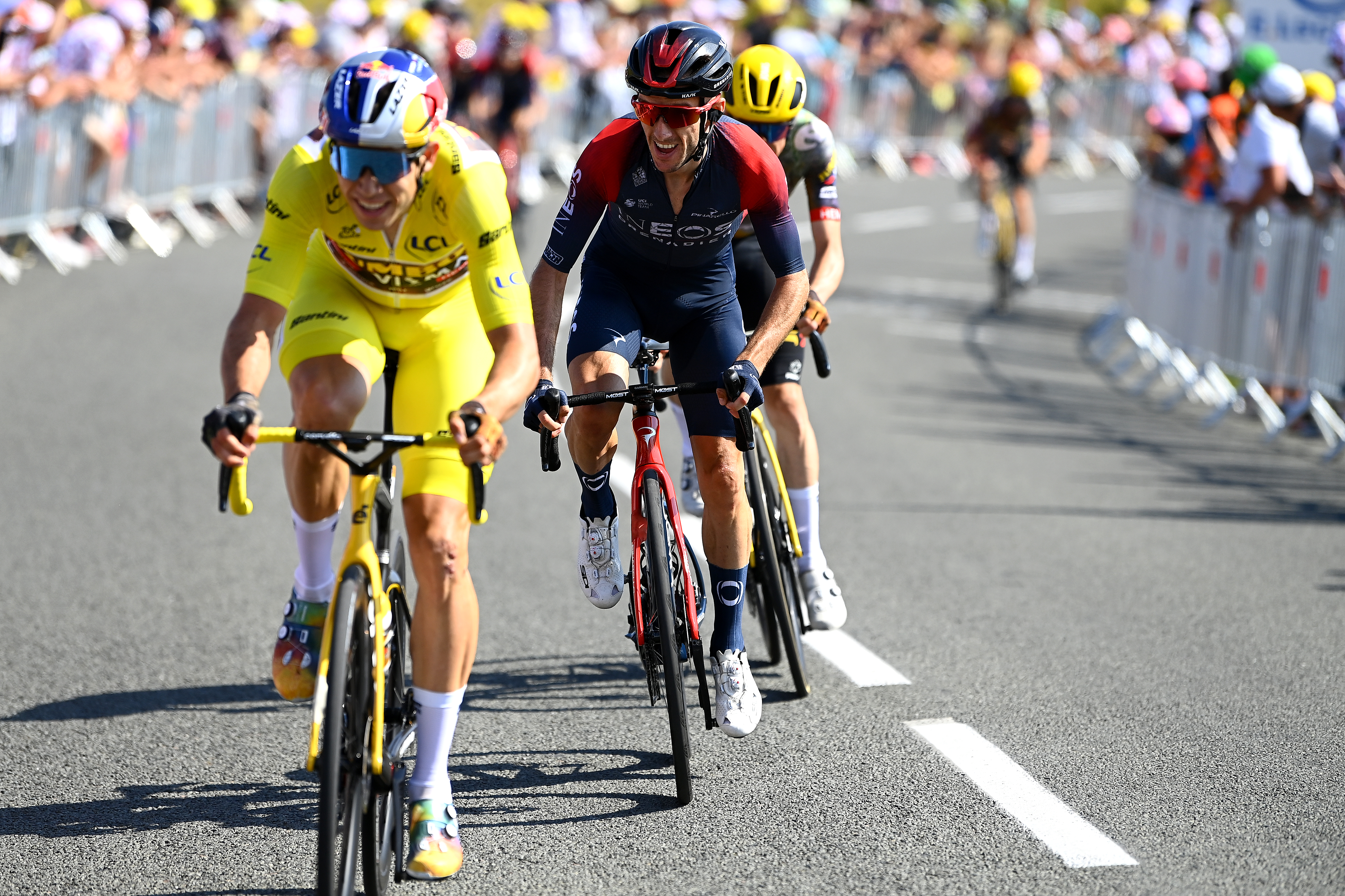 Wout Van Aert of Belgium and Team Jumbo - Visma Yellow Leader Jersey attacks in the breakaway ahead of Adam Yates of United Kingdom and Team INEOS Grenadiers during the 109th Tour de France 2022, Stage 4 a 171,5km stage from Dunkerque to Calais.