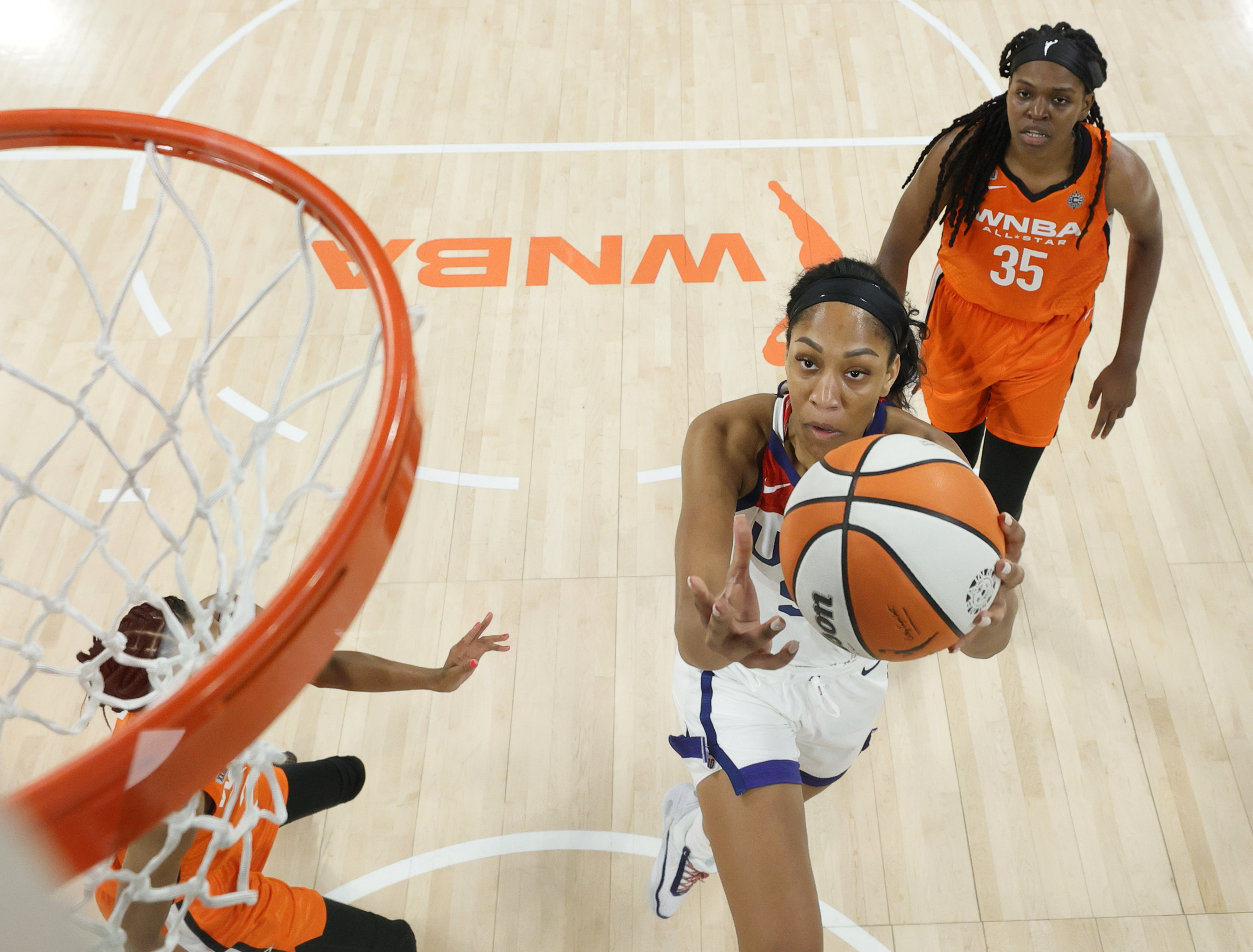 A’ja Wilson #9 of the USA Women’s National Team shoots ahead of Jonquel Jones #35 of Team WNBA during the 2021 WNBA All-Star Game at Michelob ULTRA Arena on July 14, 2021 in Las Vegas, Nevada. Team WNBA defeated the USA Women’s National Team 93-85.&nbsp;