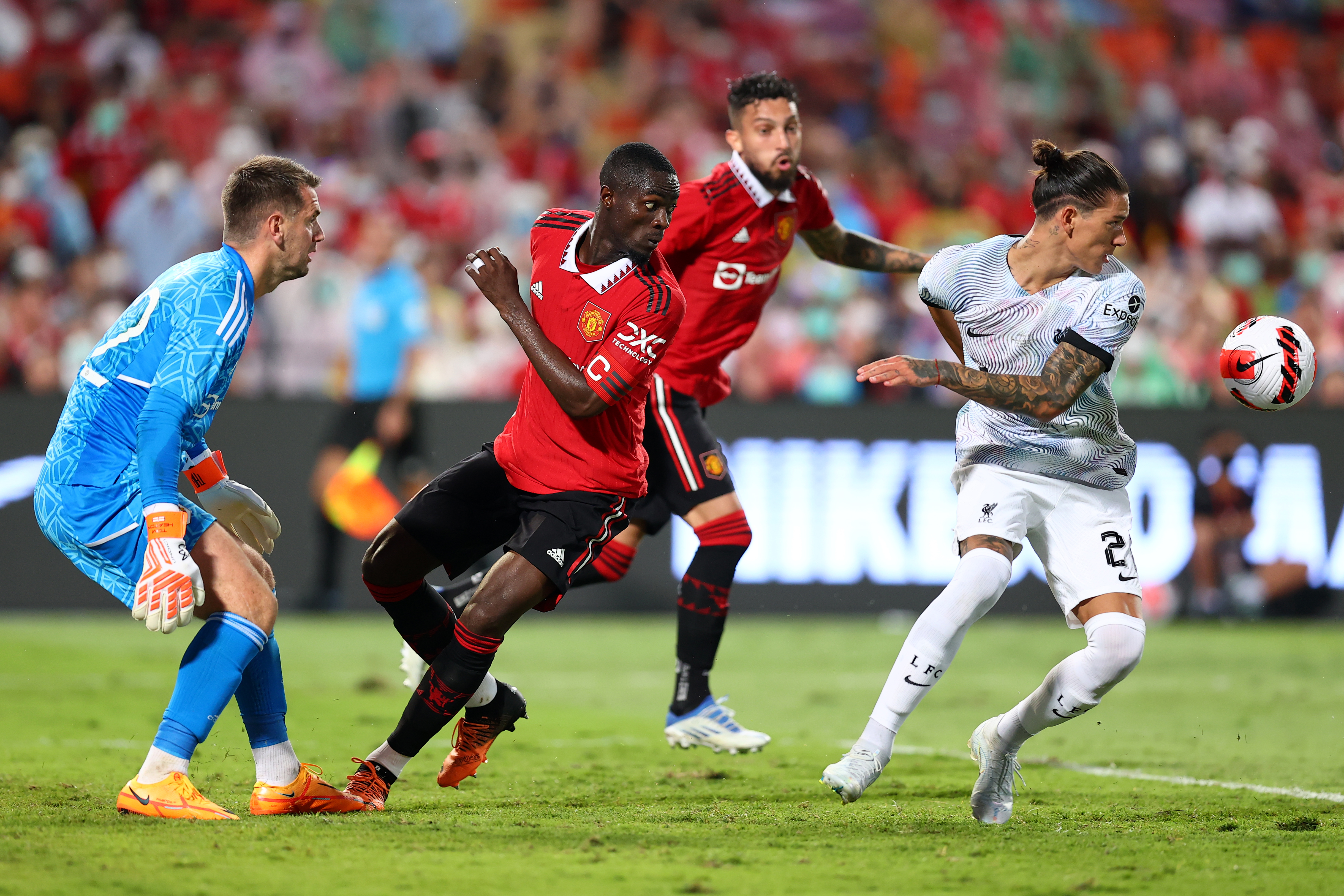 Darwin Nunez #27 of Liverpool competes for the ball against goalkeeper Tom Heaton #22 and Eric Bailly #3 of Manchester United during the second half of a preseason friendly match at Rajamangala National Stadium on July 12, 2022 in Bangkok, Thailand.