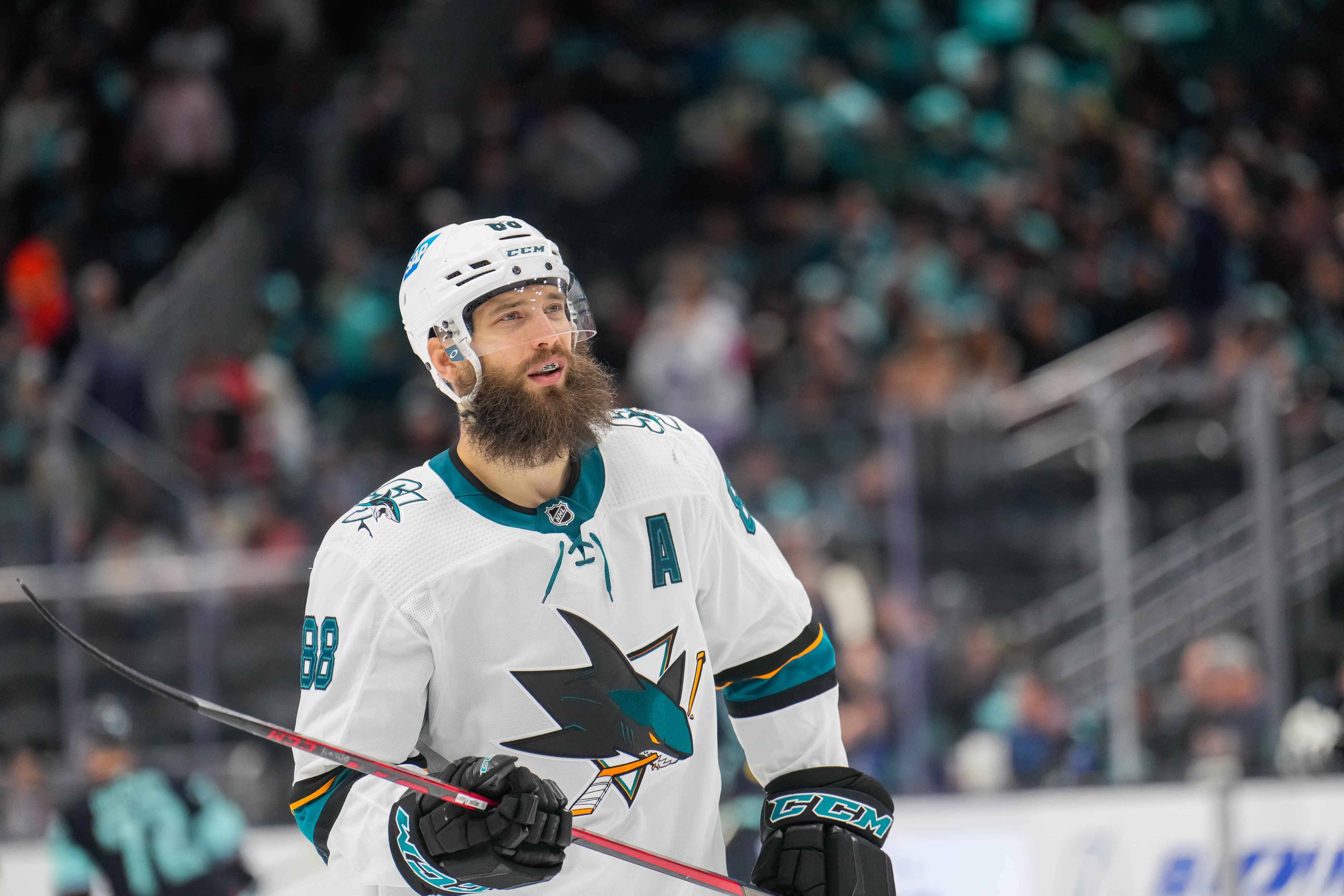 Brent Burns #88 of the San Jose Sharks looks up at the scoreboard during a stoppage in the second period of a game against the Seattle Kraken at Climate Pledge Arena on April 29, 2022 in Seattle, Washington.