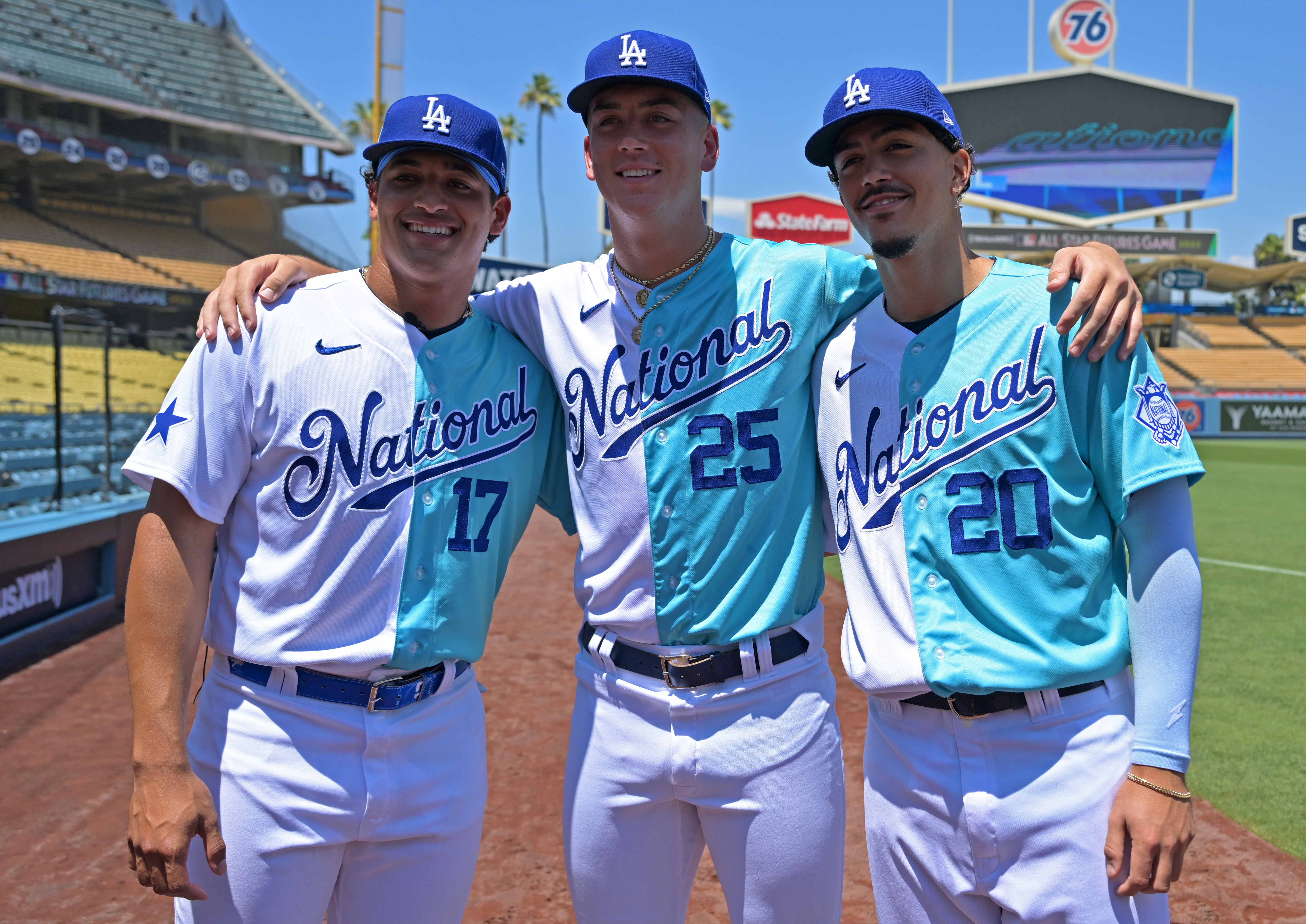Dodgers Diego Cartaya, Bobby Miller, and Miguel Vargas, all of whom played in the 2022 MLB Futures Game at Dodger Stadium, line up in the order they are ranked on the 2023 Baseball America top 100 prospects list.