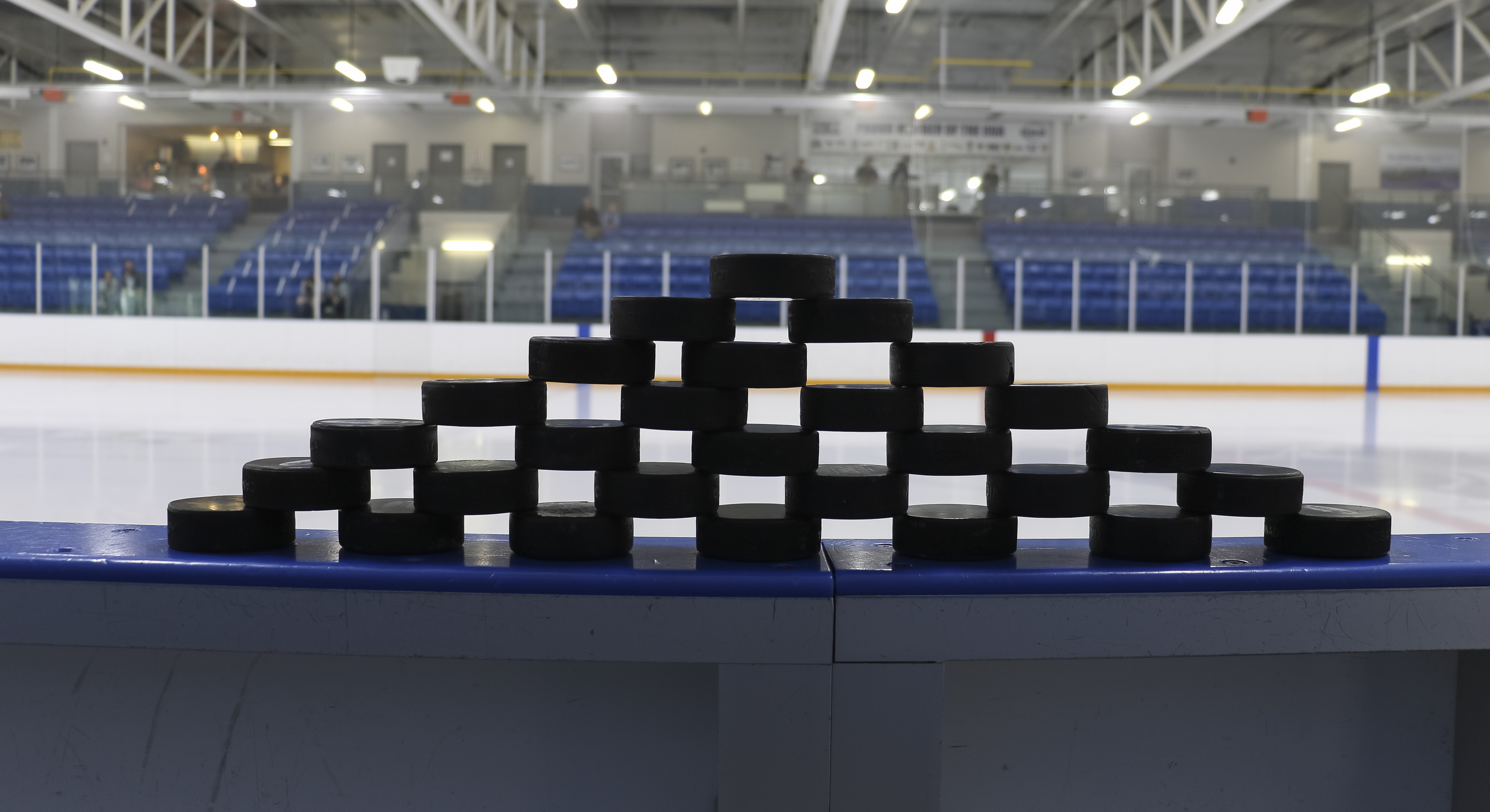 A pyramid of hockey pucks