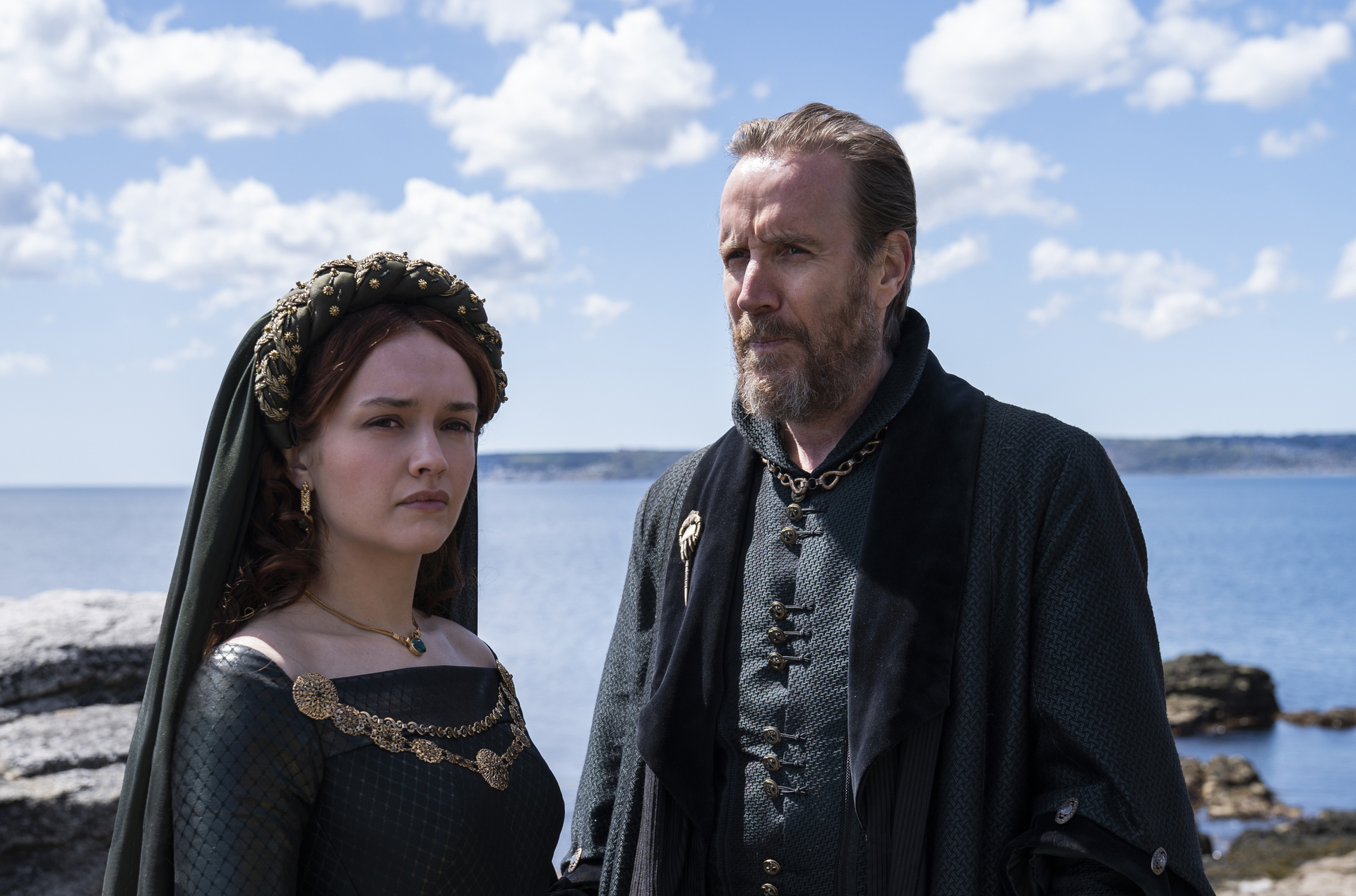 Olivia Cooke as “Alicent Hightower” and Rhys Ifans as “Otto Hightower” in House of the Dragon