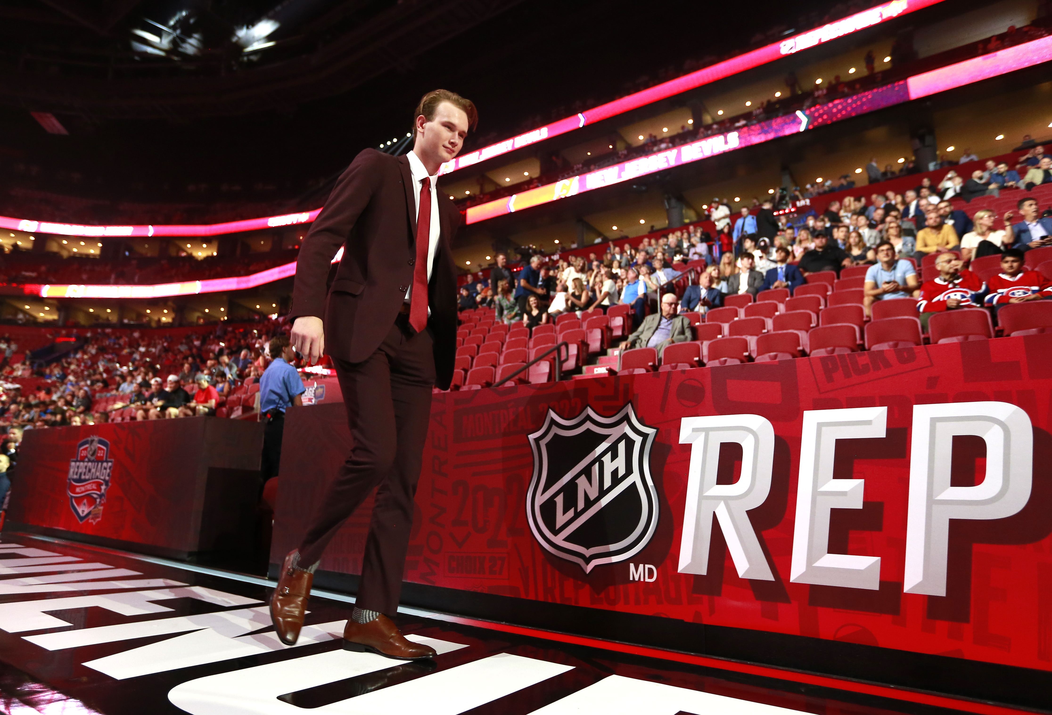 Mason Beaupit walks toward the draft table after being selected 108th overall by the San Jose Sharks during the 2022 Upper Deck NHL Draft at Bell Centre on July 08, 2022 in Montreal, Quebec.