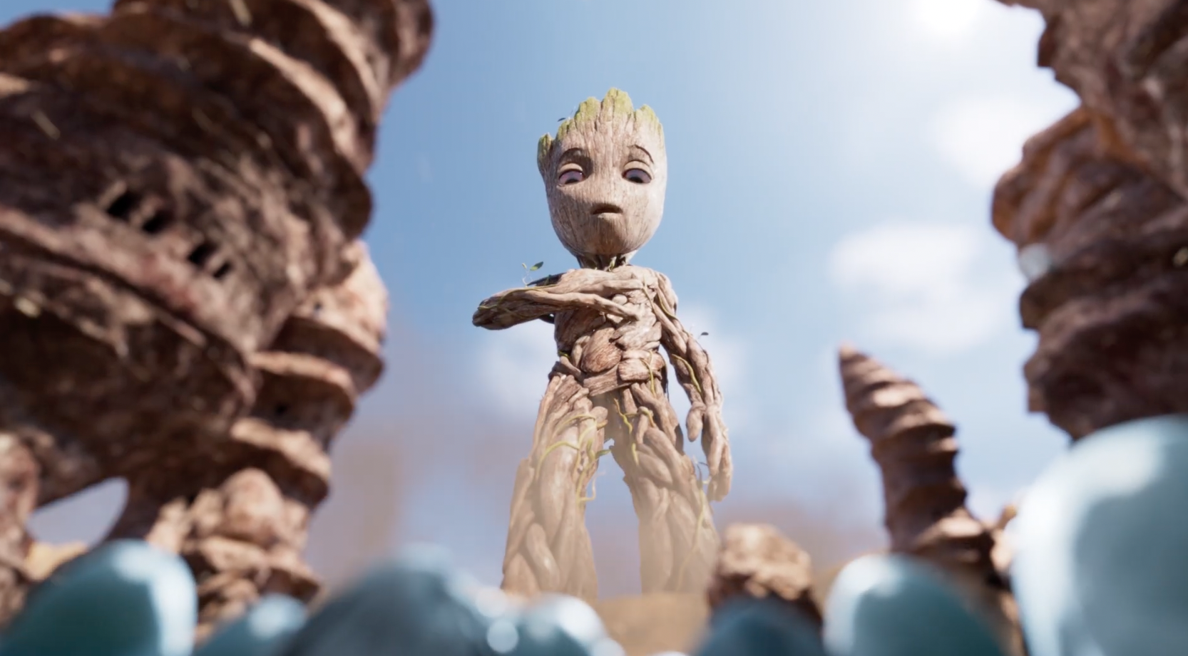 baby groot towering over some tiny tiny aliens