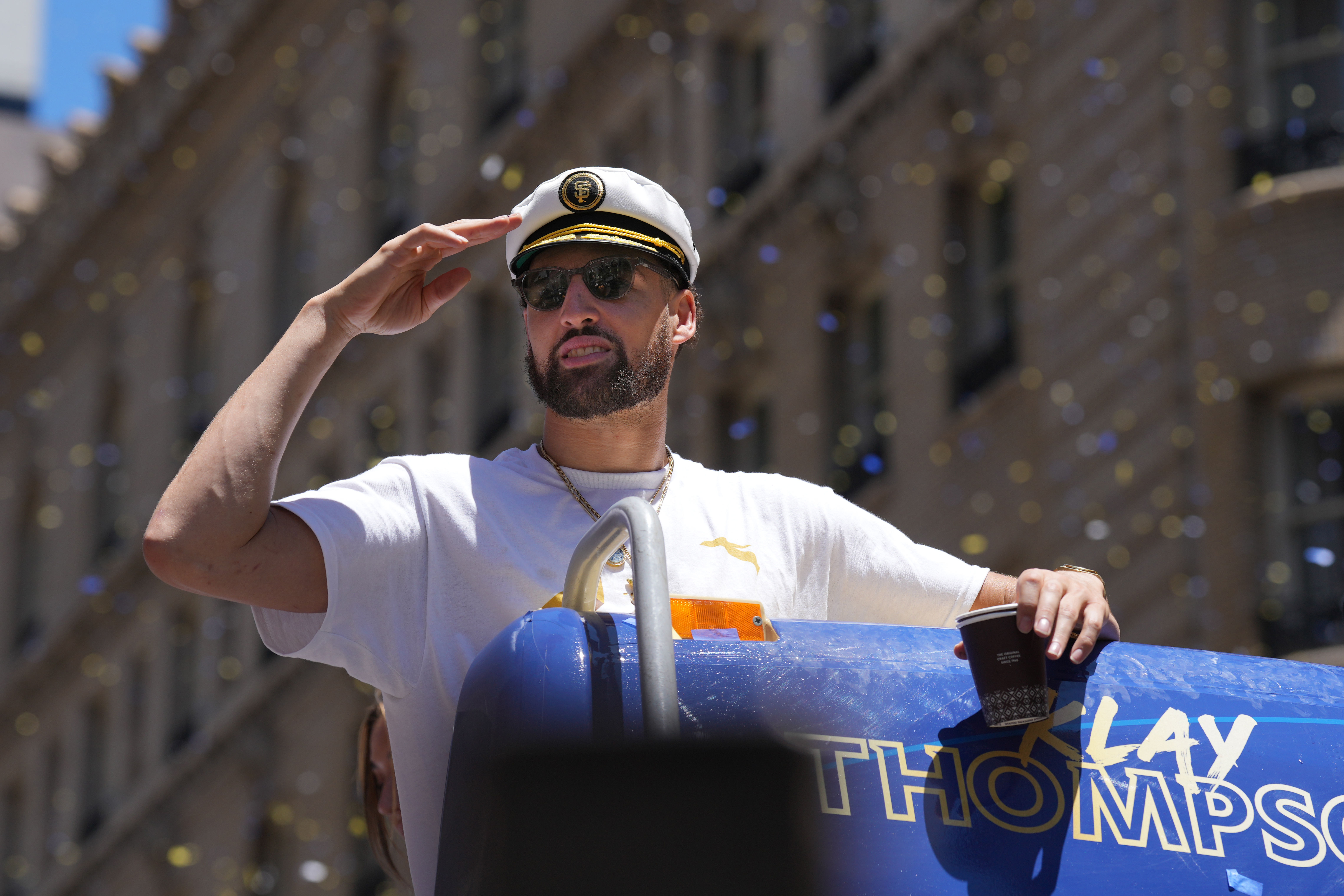 Klay Thompson saluting the crowd at the Warriors championship parade