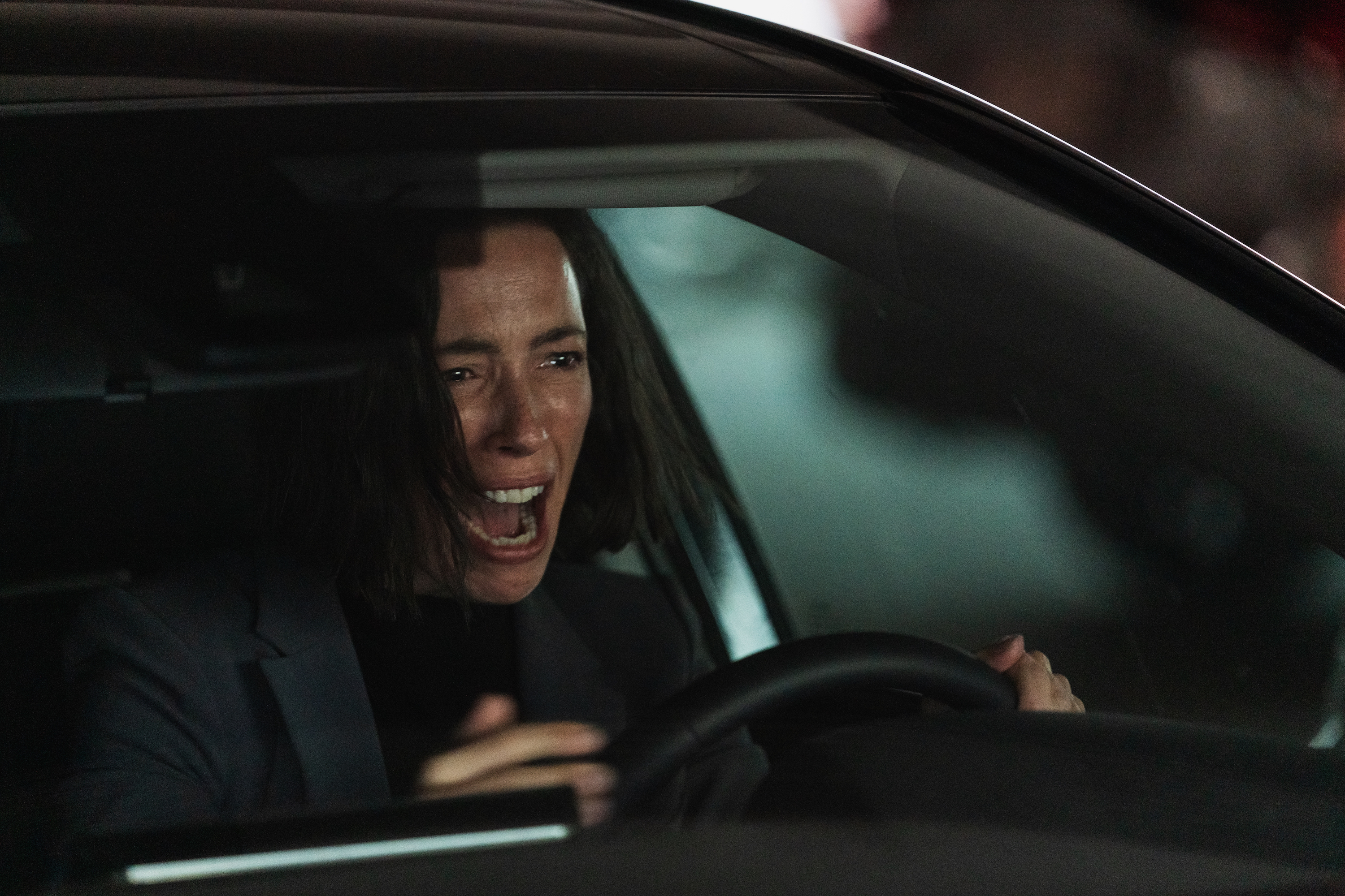 Rebecca Hall shrieks in her car at night in Resurrection