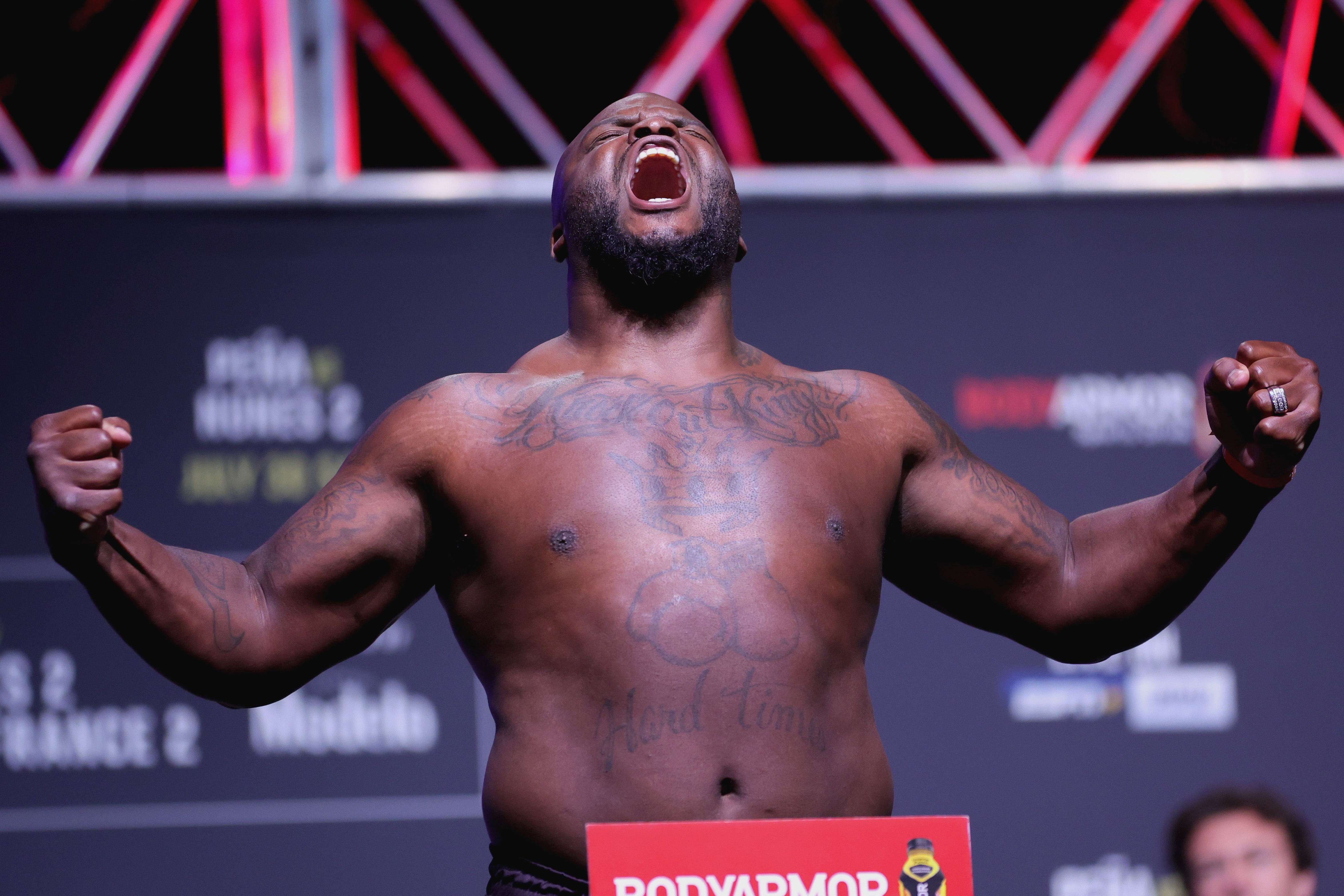 Derrick Lewis poses on the scale during the UFC 277 ceremonial weigh-in at American Airlines Center on July 29, 2022 in Dallas, Texas.