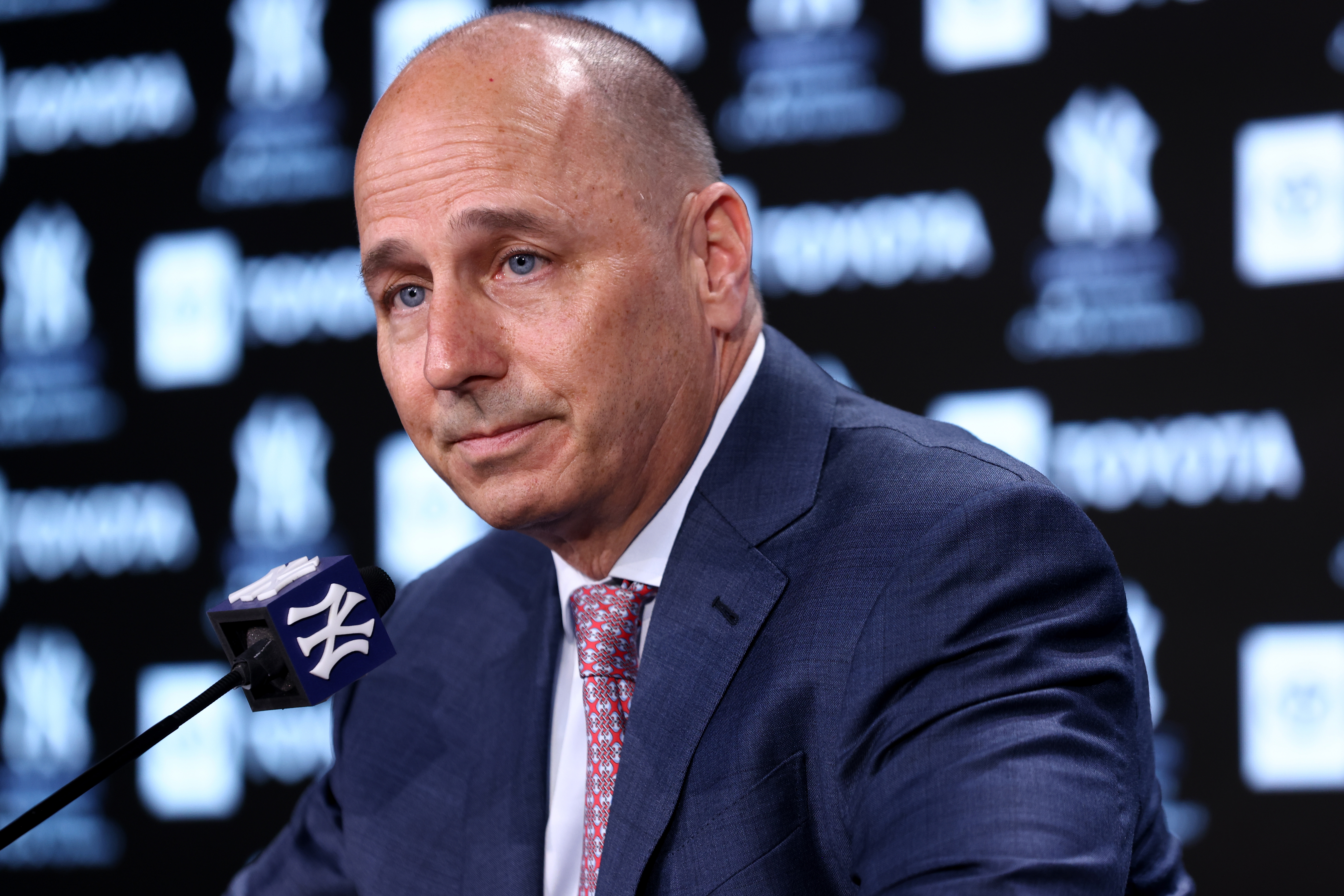 New York Yankees General Manager Brian Cashman speaks to the media prior to the start of the game against the Boston Red Sox at Yankee Stadium on April 08, 2022 in New York City.