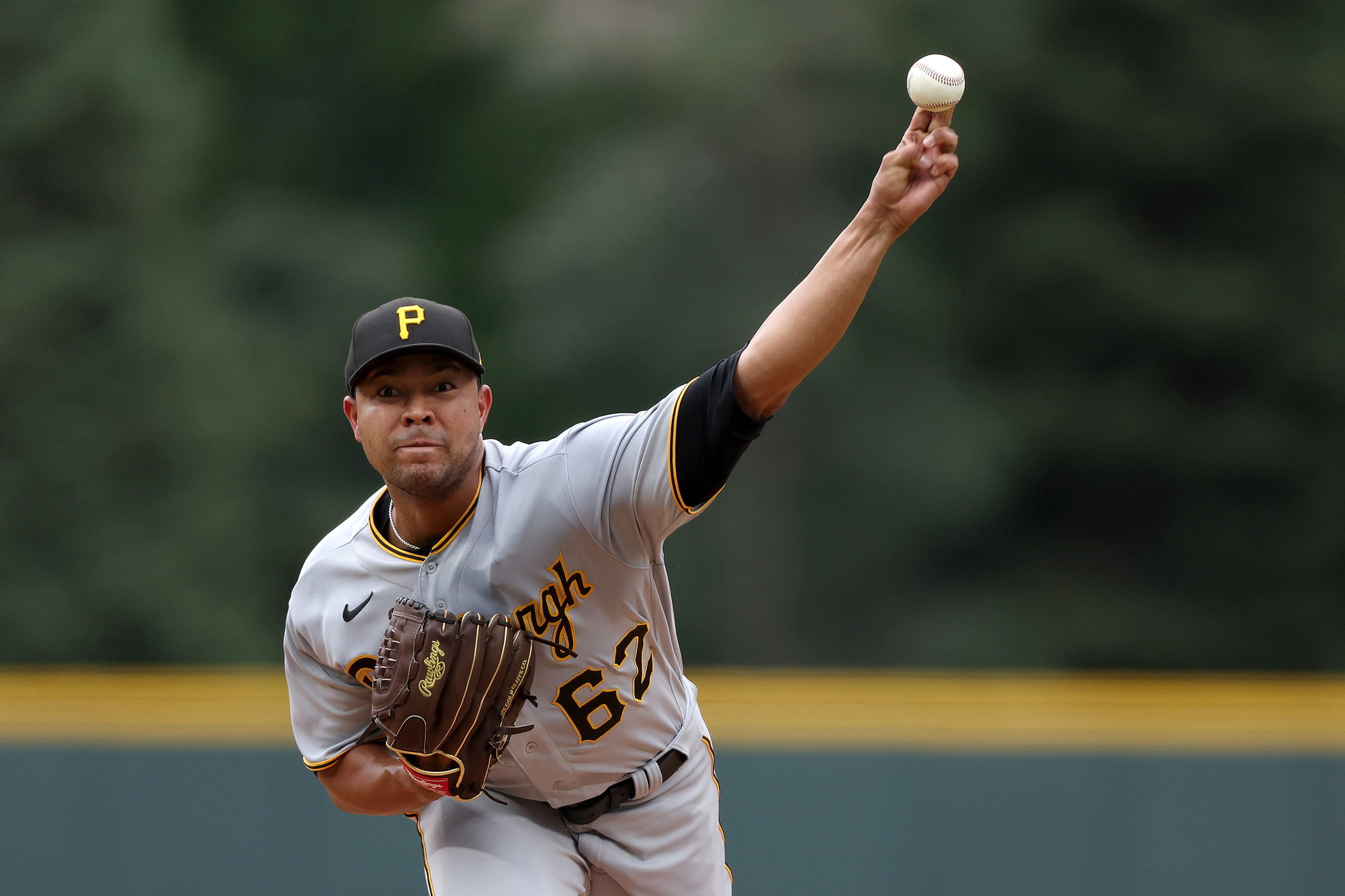 Starting pitcher Jose Quintana #62 of the Pittsburgh Pirates throws against the Colorado Rockies in the first inning at Coors Field on July 15, 2022 in Denver, Colorado.