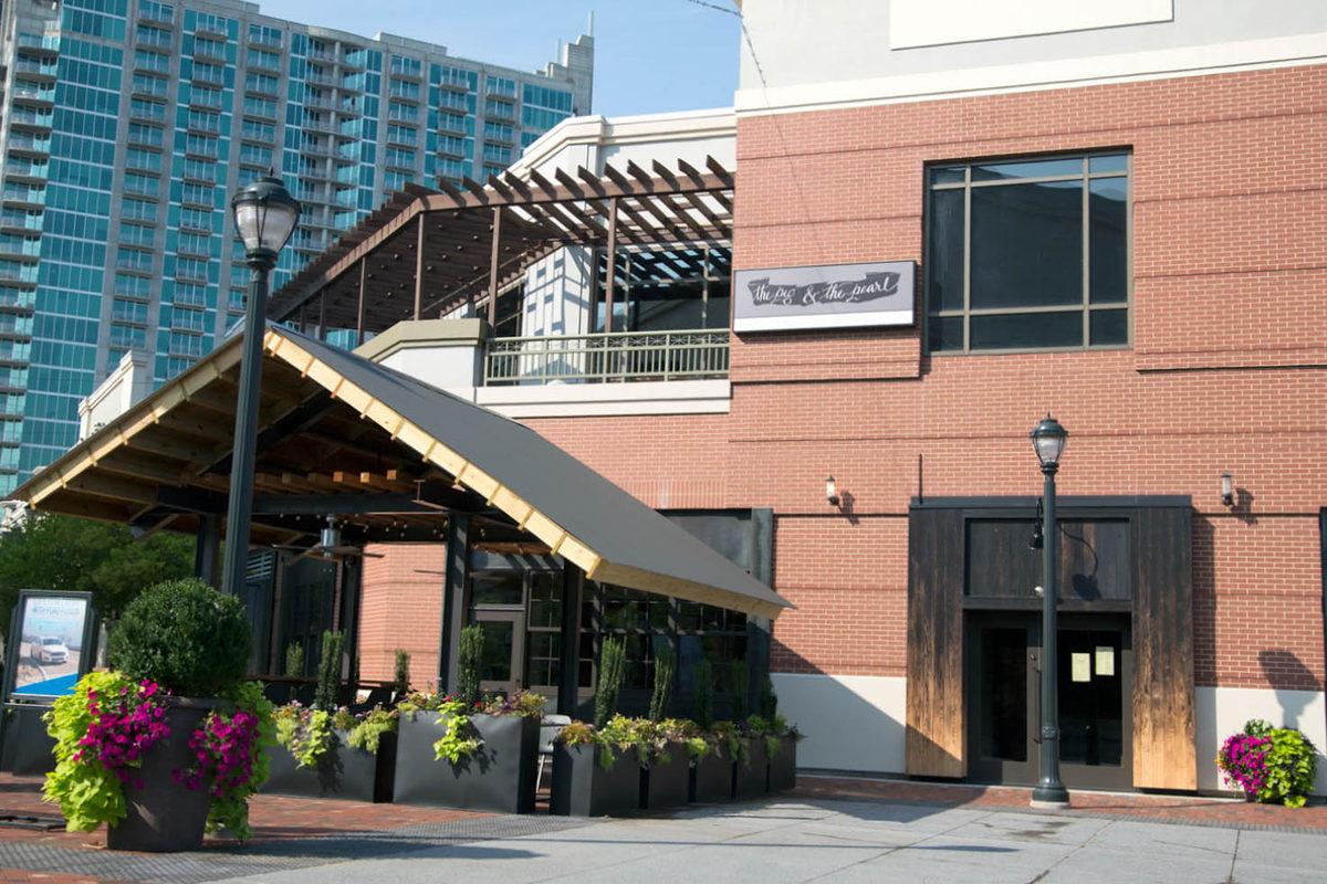 The brick exterior of barbecue restaurant and raw bar the Pig and the Pearl when it first opened at Atlantic Station in Atlanta in 2014. 