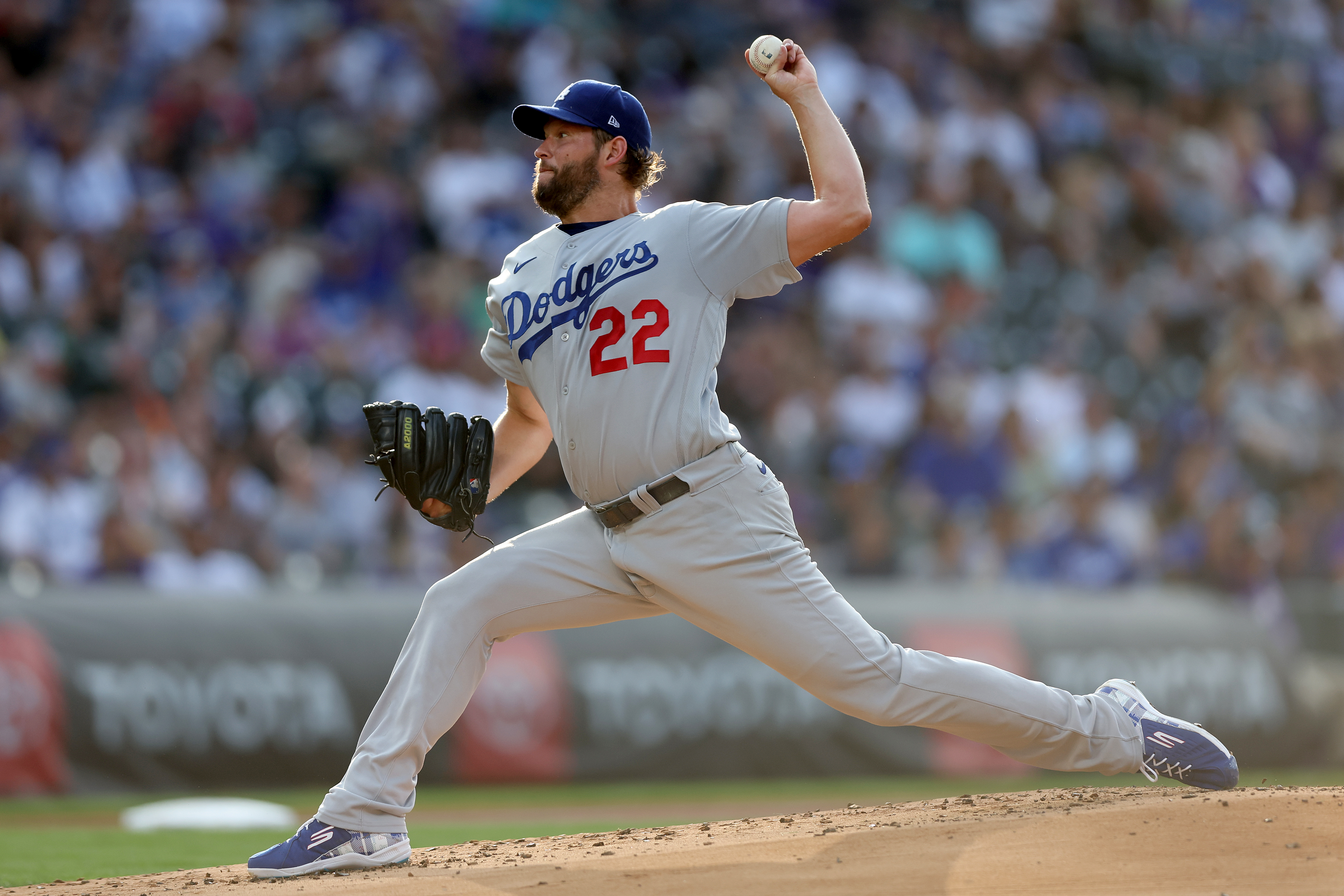 Starting pitcher Clayton Kershaw #22 of the Los Angels Dodgers throws against the Colorado Rockies in the first inning at Coors Field&nbsp;