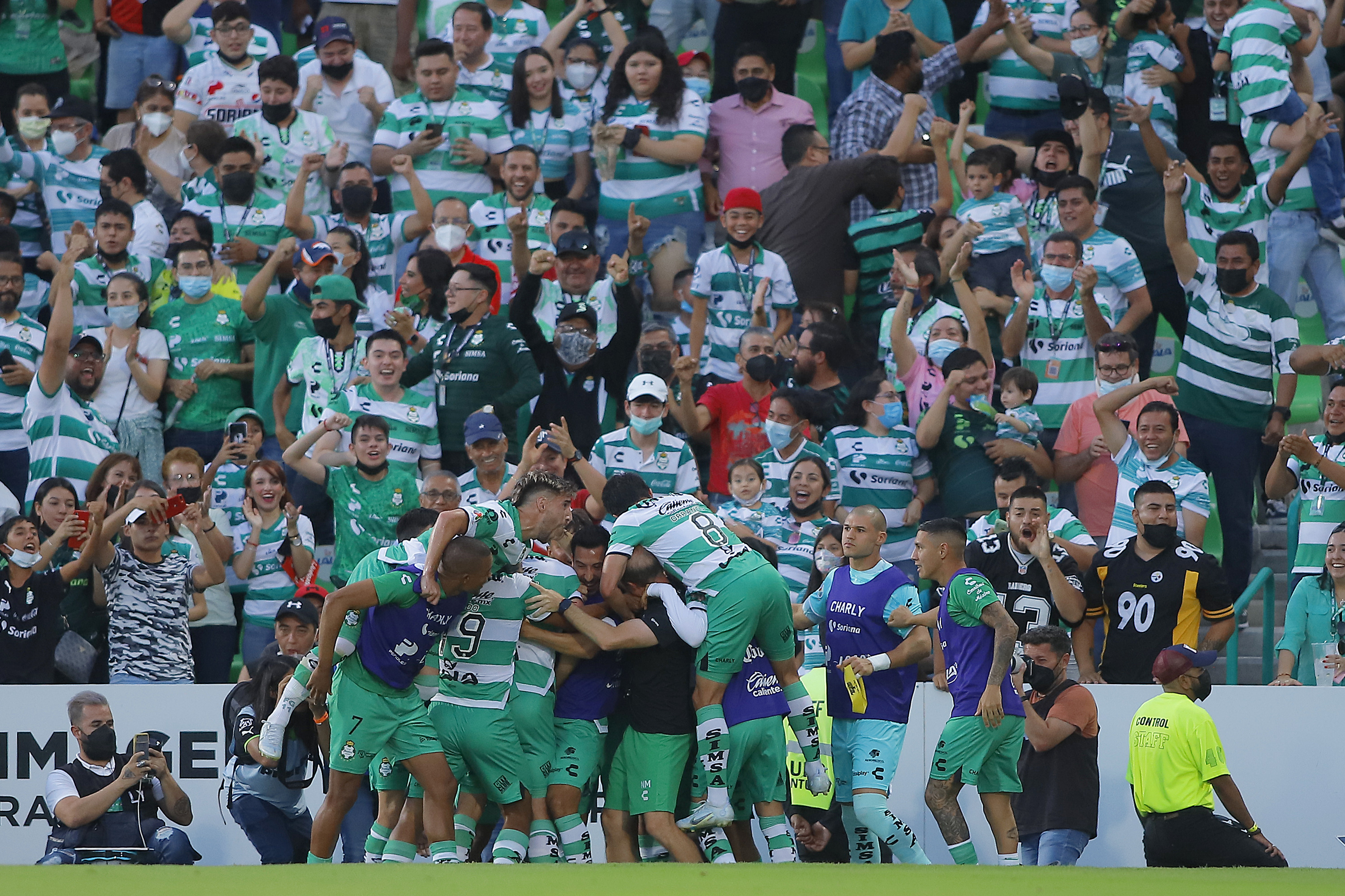 Juan Brunetta of Santos celebrates with teammates after scoring the first goal of his team during the 6th round match between Santos Laguna and Atlas as part of the Torneo Apertura 2022 Liga MX at Corona Stadium on July 31, 2022 in Torreon, Mexico.