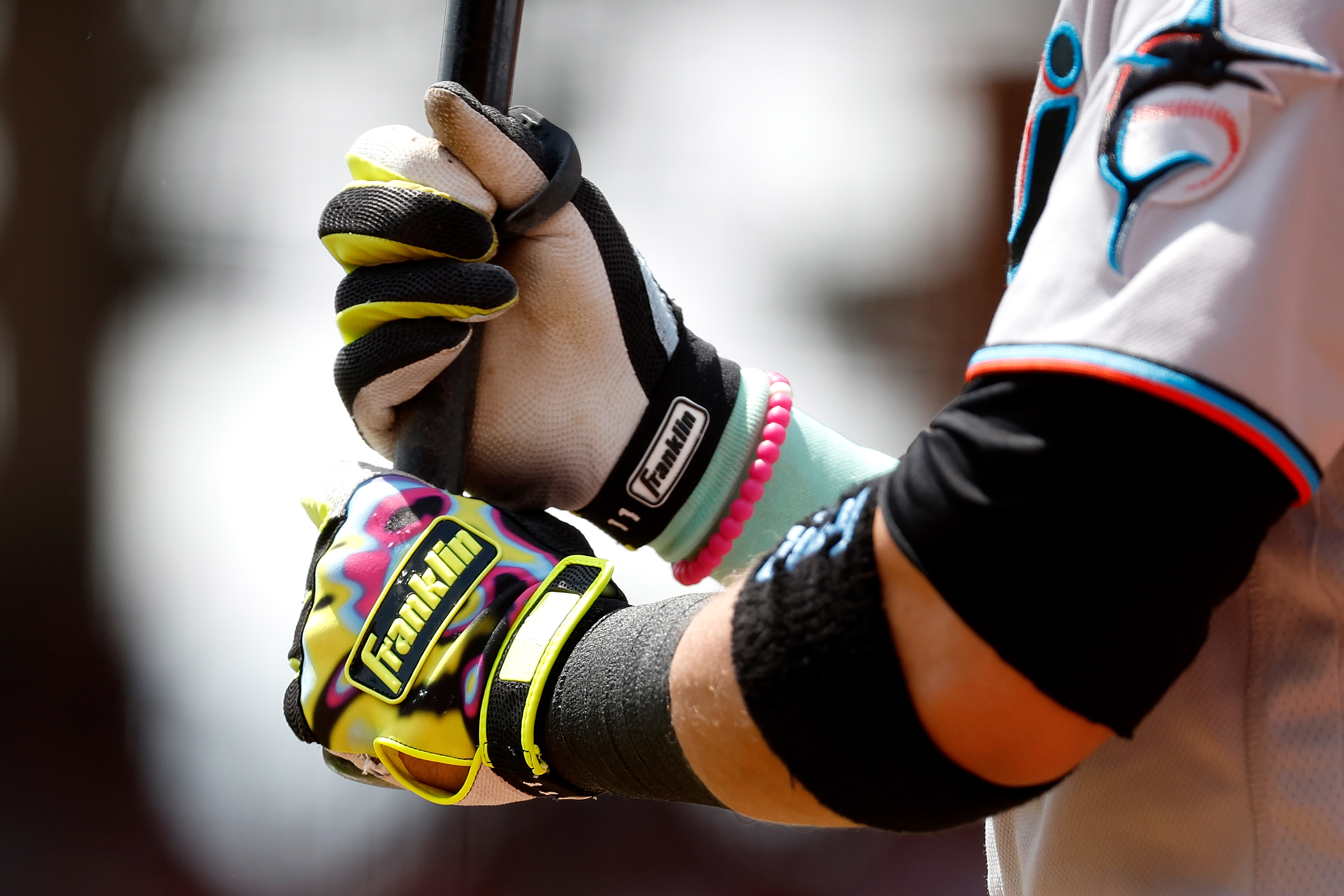 A detail of the Franklin batting gloves worn by Miguel Rojas #11 of the Miami Marlins during the game against the Cincinnati Reds at Great American Ball Park on July 28, 2022 in Cincinnati, Ohio.