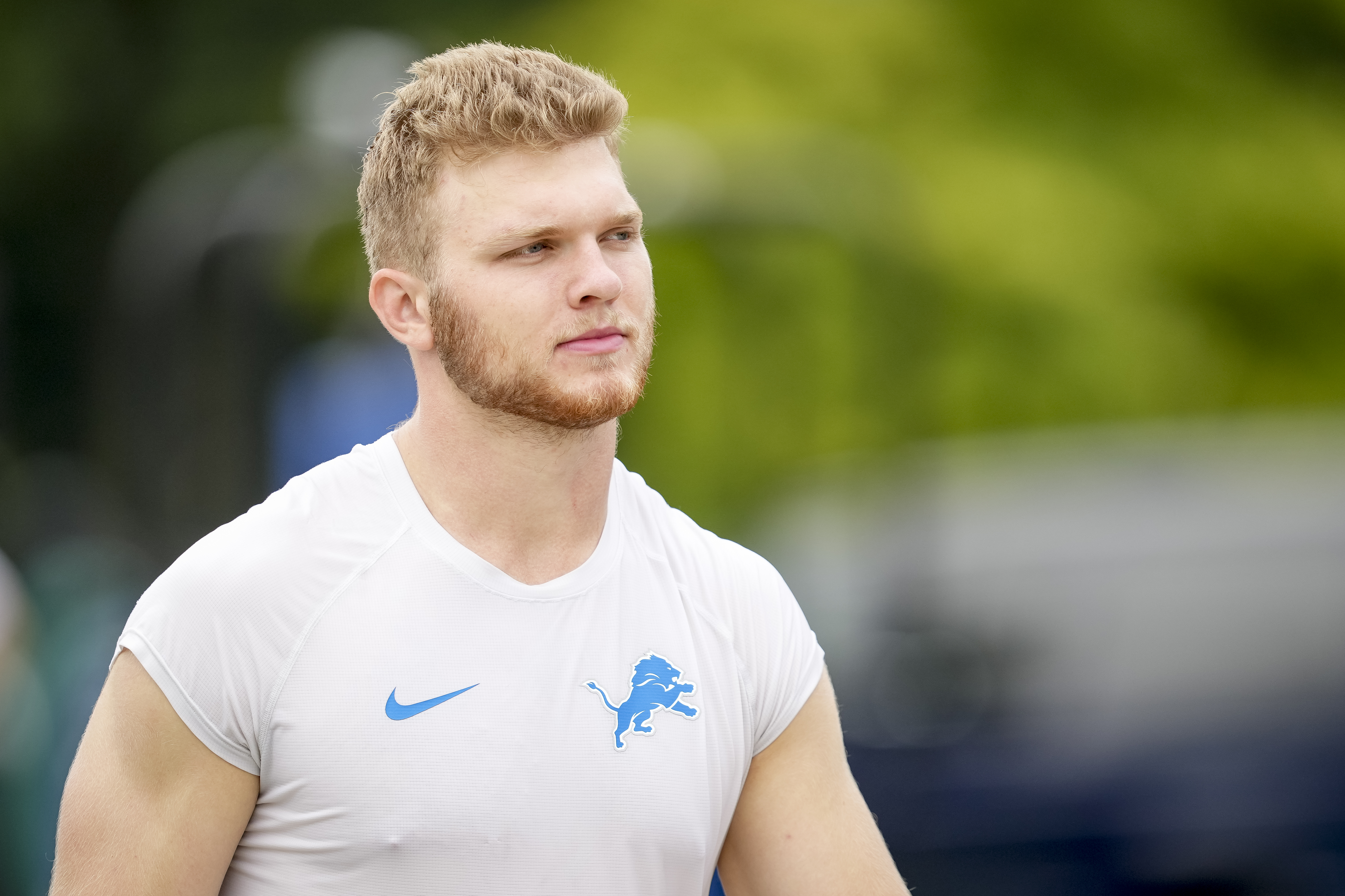 Aidan Hutchinson #97 of the Detroit Lions looks on during the Detroit Lions Training Camp on July 27, 2022 at the Lions Headquarters and Training Facility in Allen Park, Michigan.