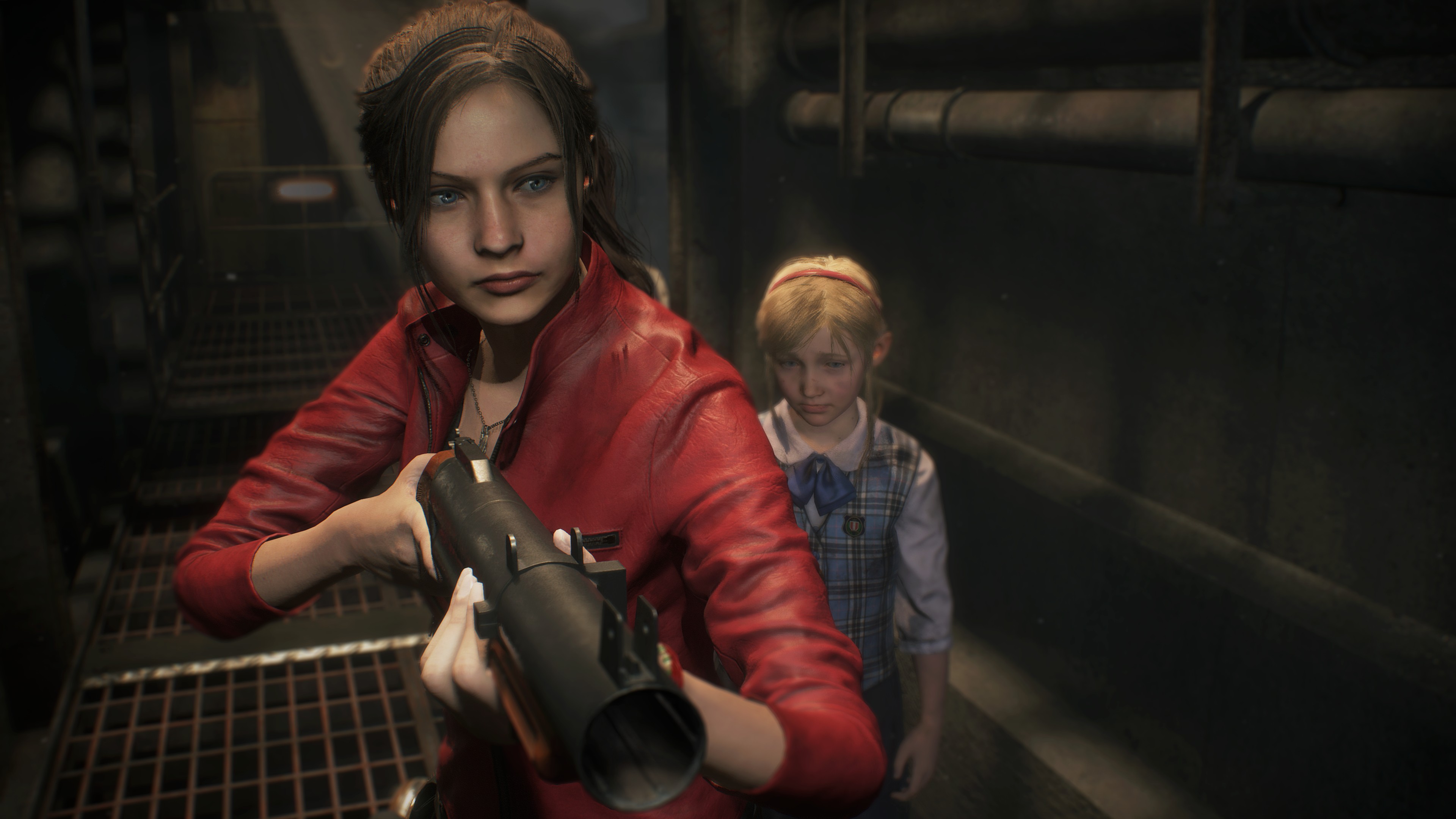 Claire aims her gun into the darkness in Resident Evil 2