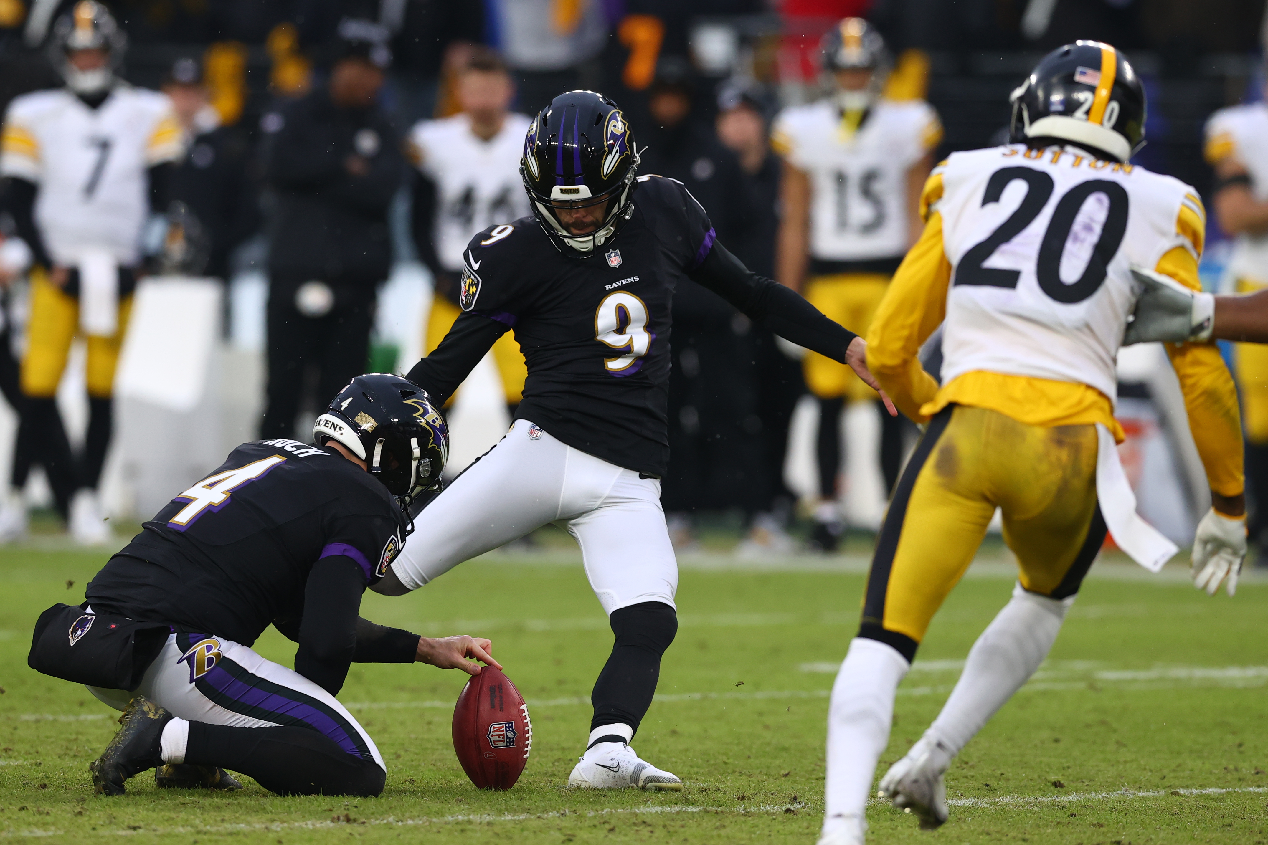 Justin Tucker #9 of the Baltimore Ravens kicks a field goal during the fourth quarter in the game against the Pittsburgh Steelers at M&amp;T Bank Stadium on January 09, 2022 in Baltimore, Maryland.