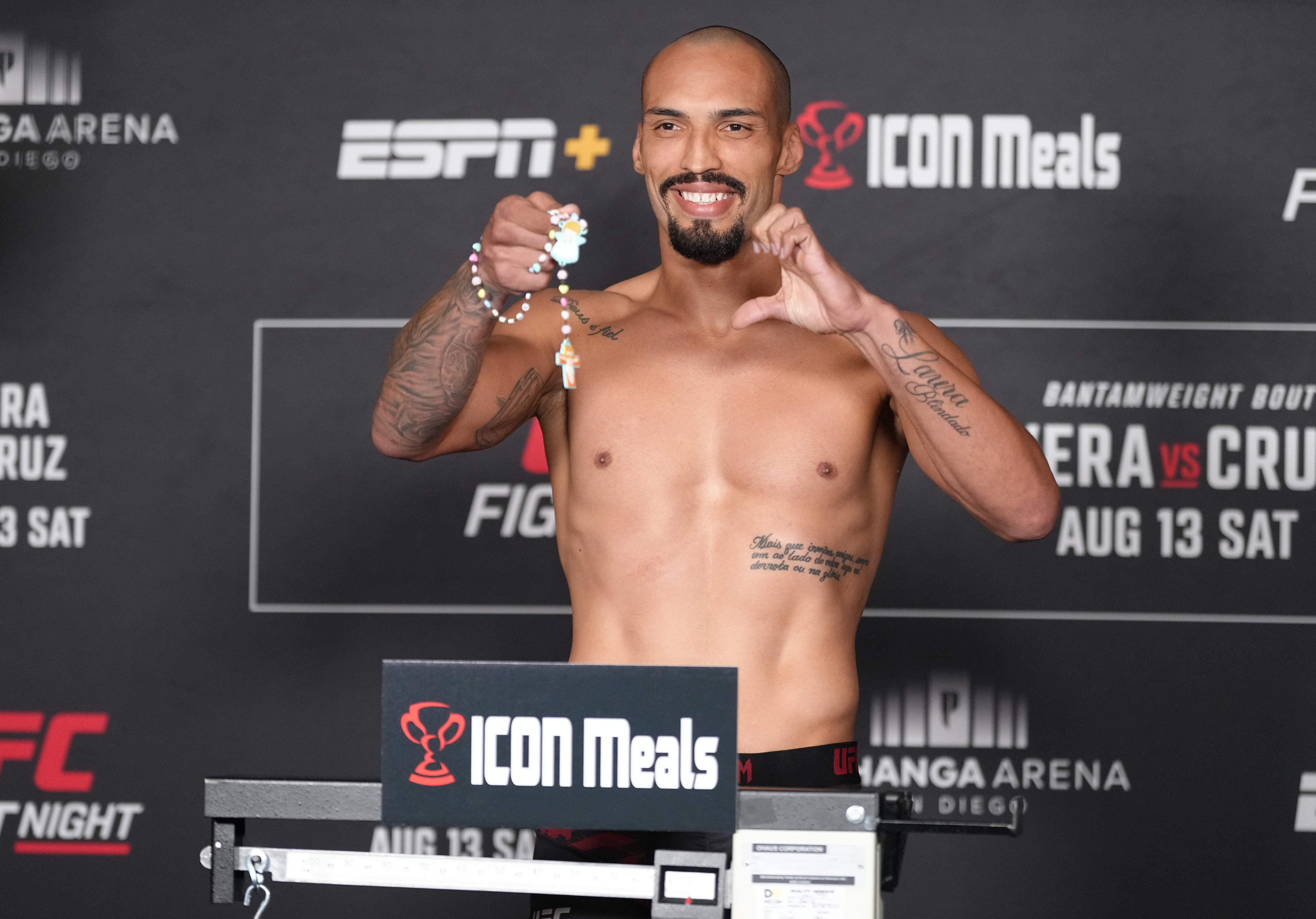 Bruno Silva of Brazil poses on the scale during the UFC Fight Night official weigh-in at the Sheraton San Diego Hotel and Marina on August 12, 2022 in San Diego, California.