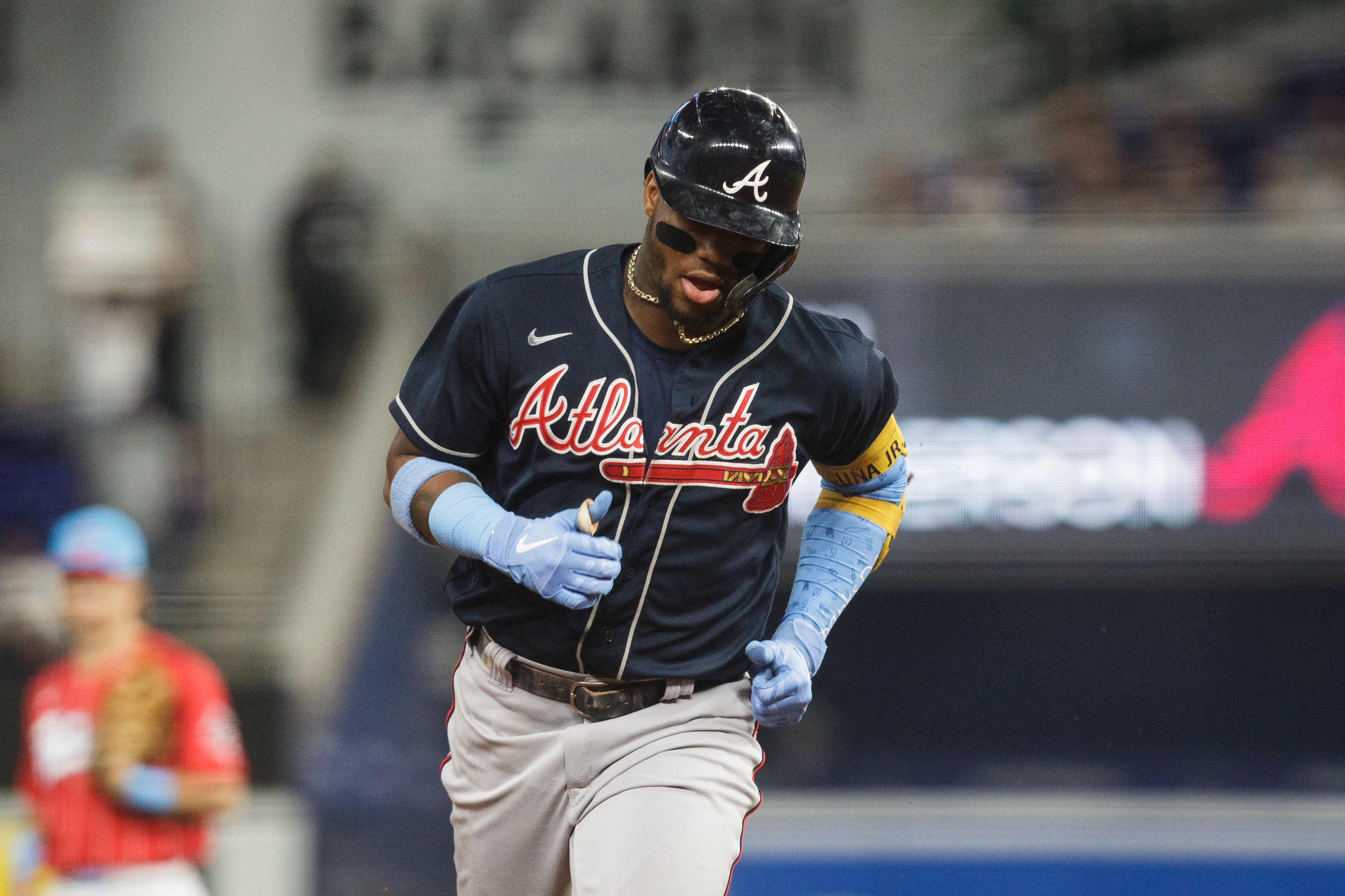 Ronald Acuña Jr. #13 of the Atlanta Braves rounds the bases after hitting a home run during the 1st inning against the Miami Marlins at loanDepot park on August 13, 2022 in Miami, Florida.