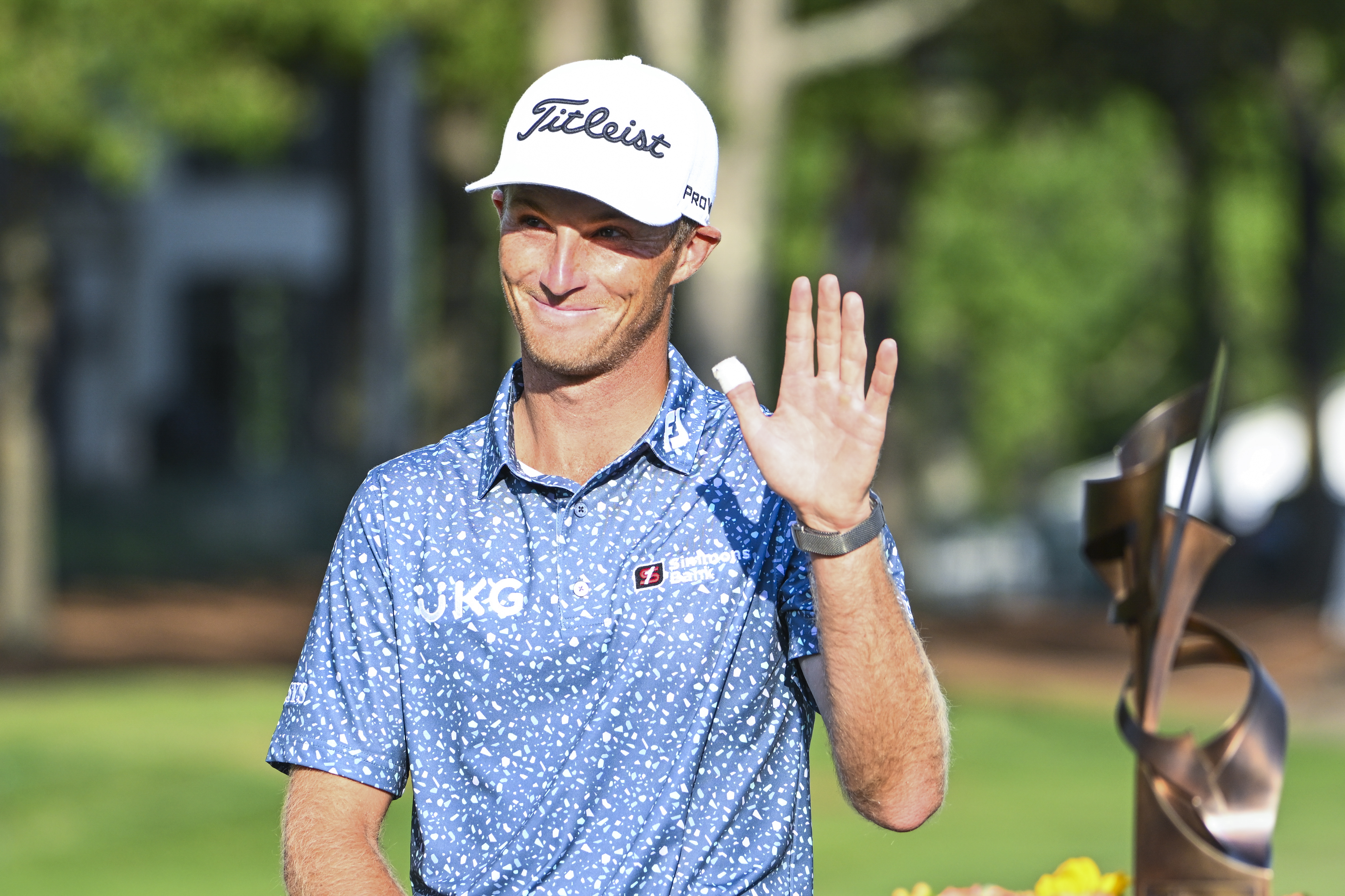 Will Zalatoris waves during the trophy ceremony after a playoff in the final round of the FedEx St. Jude Championship at TPC Southwind on August 14, 2022 in Memphis, Tennessee.
